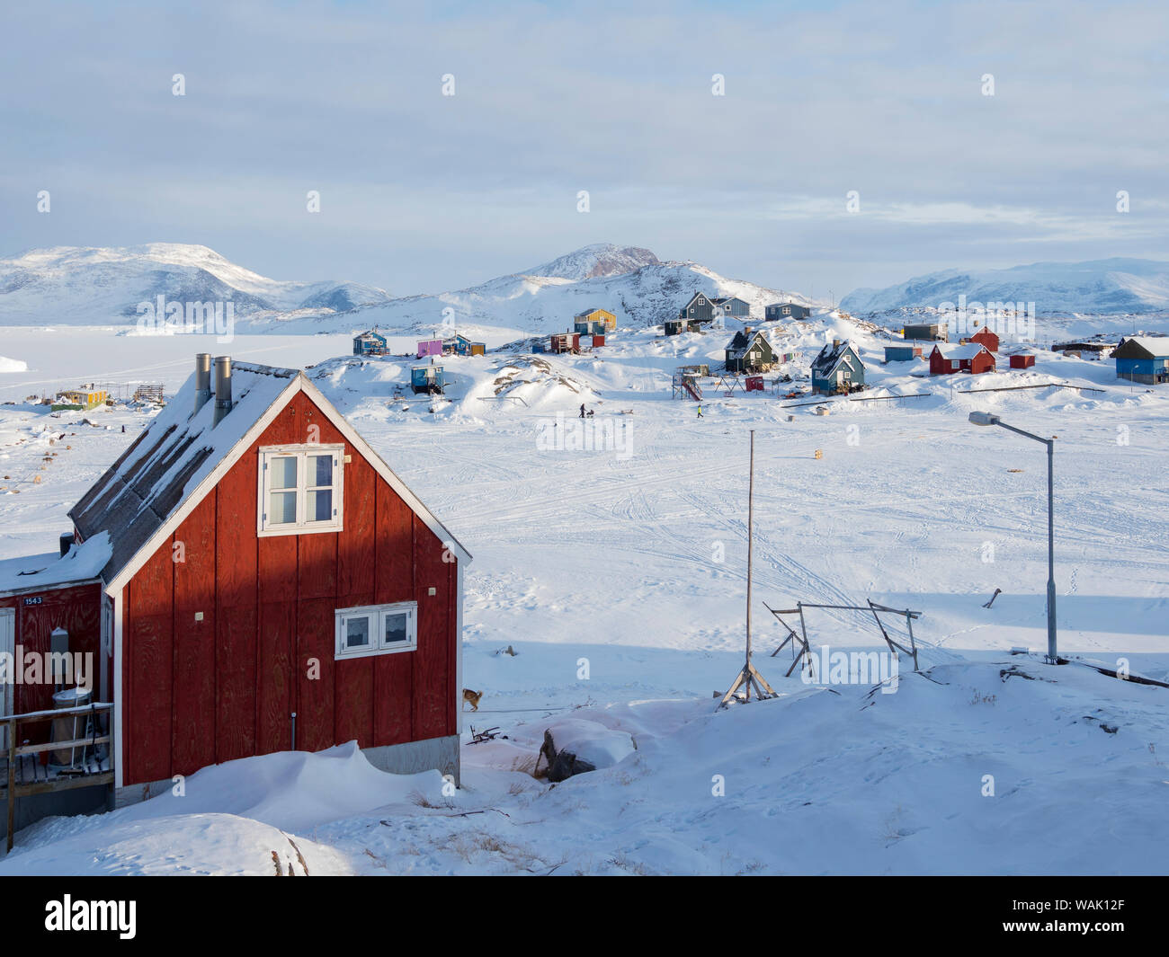 Ikerasak village de pêche en hiver, dans l'Uummannaq Fjord, au nord du cercle polaire. Le Groenland. Banque D'Images
