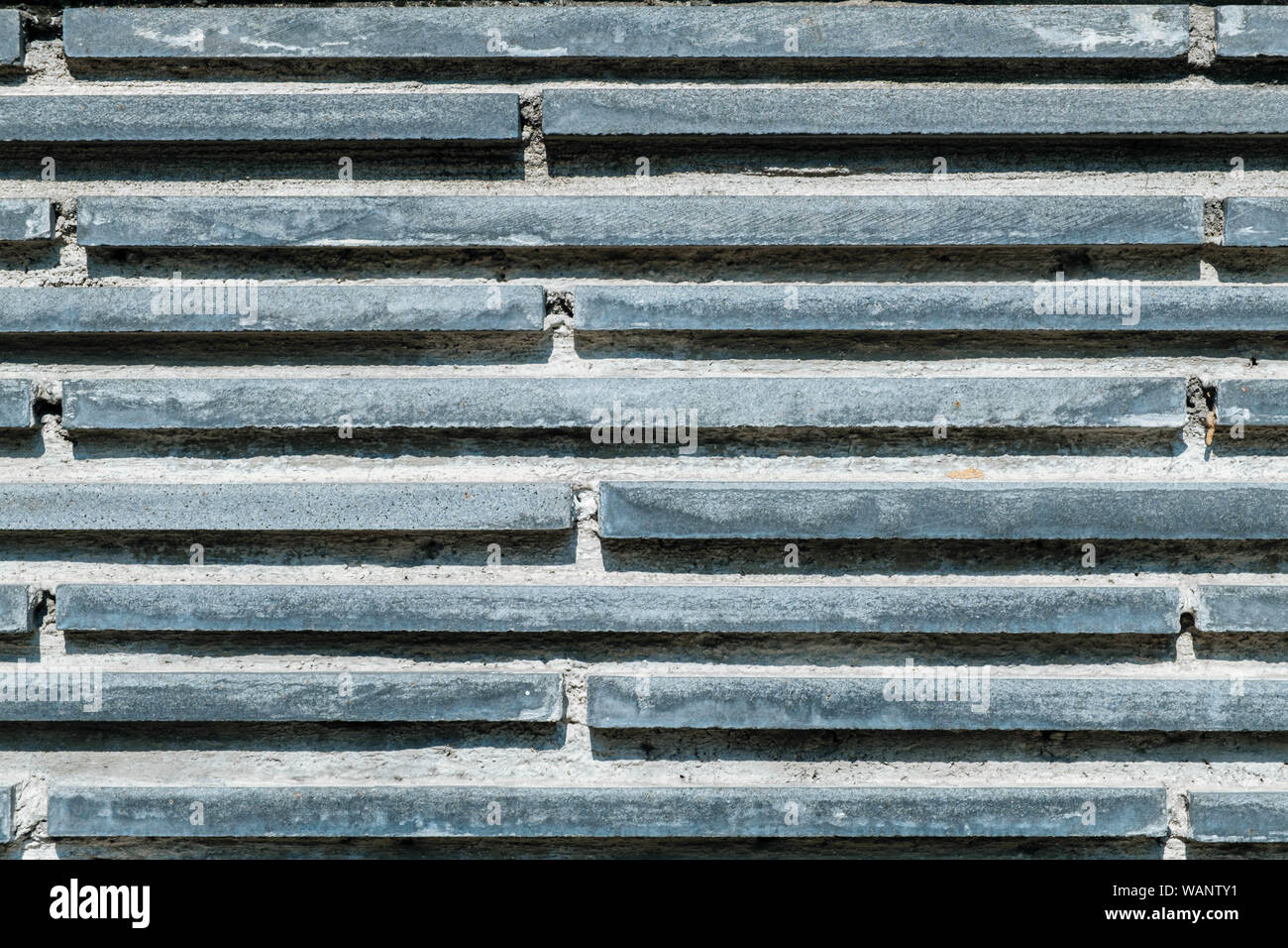 Ressources graphiques texture mur de briques gris fond bloc Banque D'Images