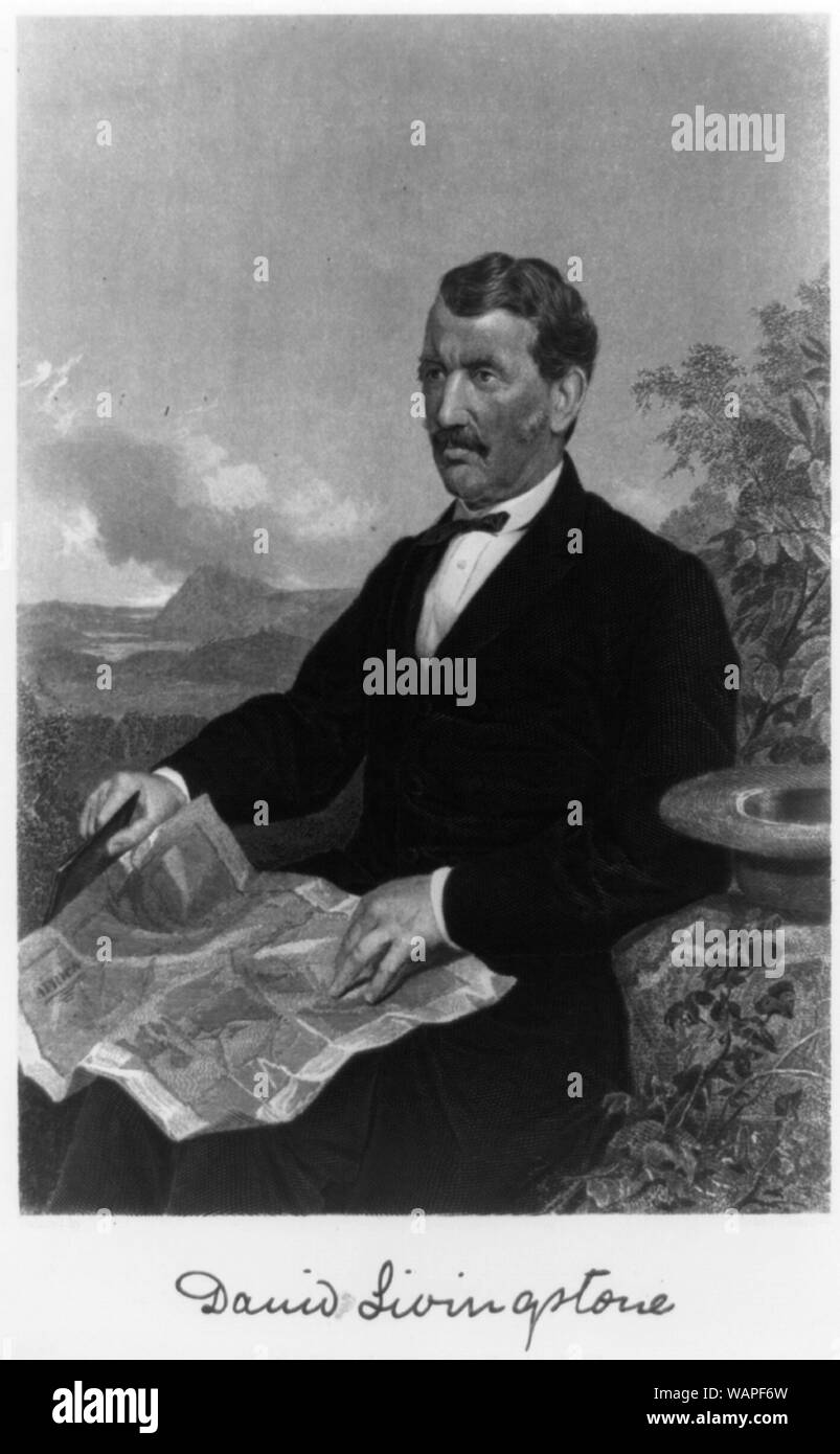 David Livingstone, trois-quarts portrait, assis, face vers la gauche, tenant la carte de l'Afrique Banque D'Images