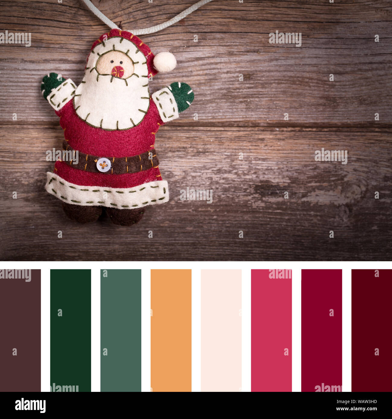 Sentir la main du Père Noël, décoration de Noël. Style vintage, sur fond  sombre. Dans une palette de couleurs avec des échantillons de couleur Photo  Stock - Alamy
