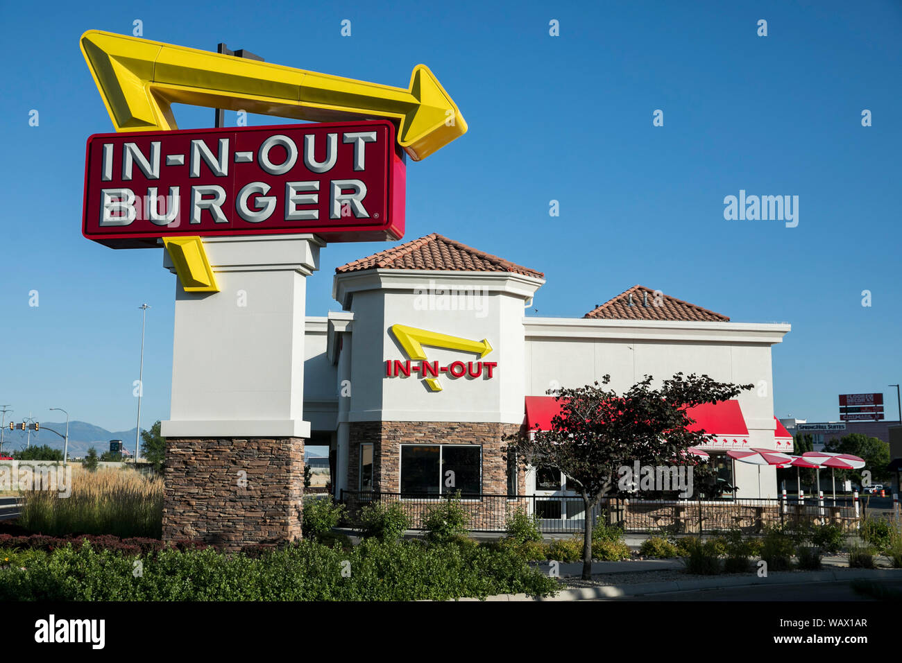 Un logo affiche à l'extérieur d'un In-N-Out Burger fast food restaurant location à American Fork, Utah le 28 juillet 2019. Banque D'Images