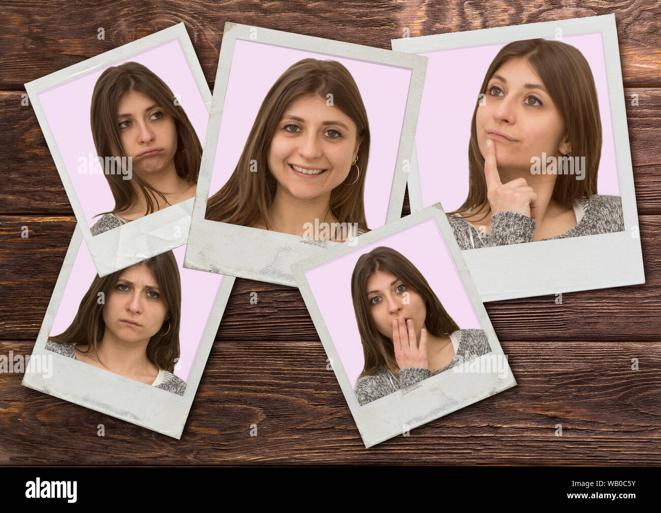 Pretty young caucasian girl montre diverses expressions du visage sur la texture du bois de polaroid Banque D'Images