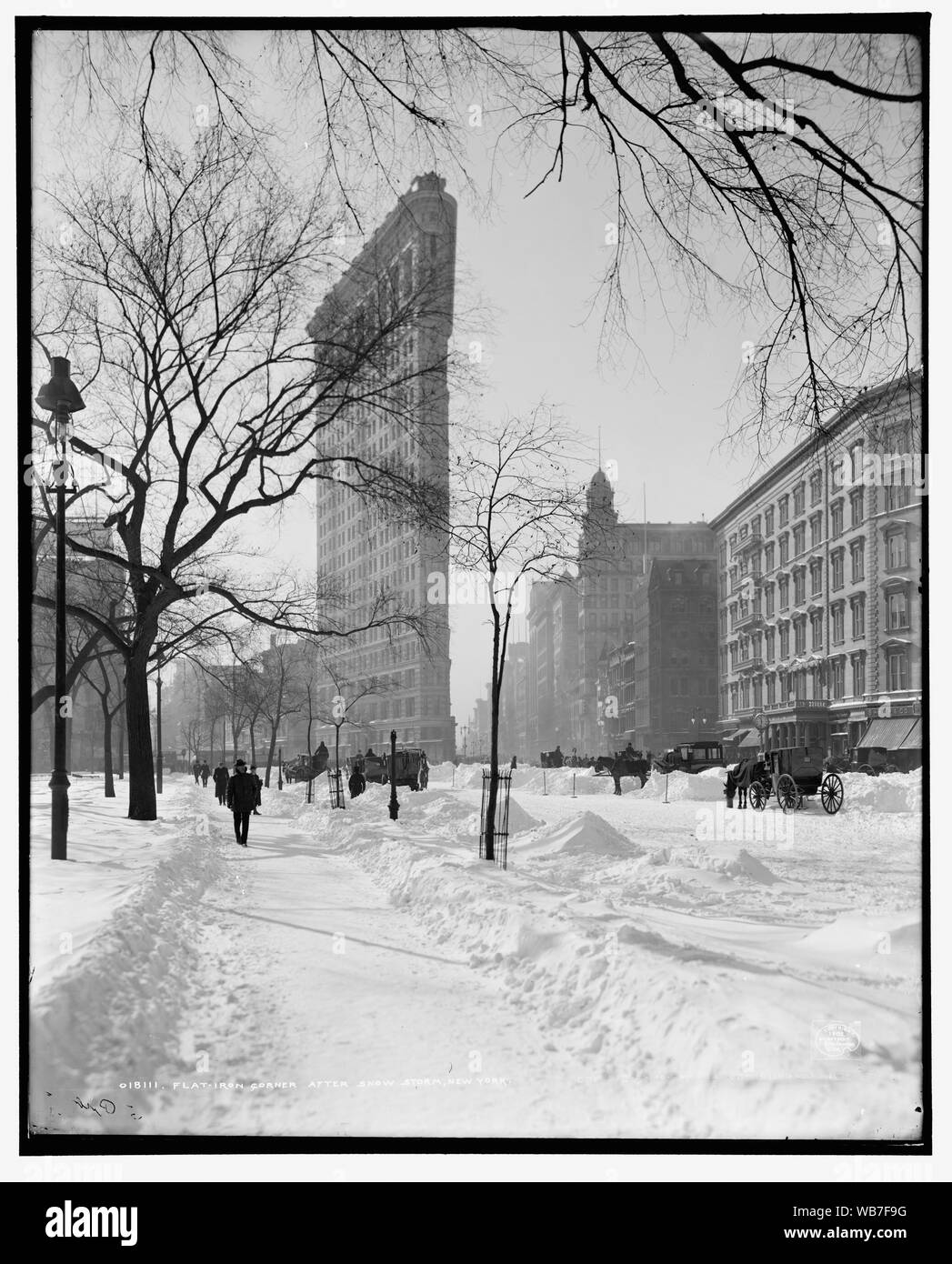 Fer à repasser [c.-à-d. Flatiron Building] corner après une tempête de neige, New York ; Fer à repasser [c.-à-d. Flatiron Building] corner après une tempête de neige, New York Banque D'Images