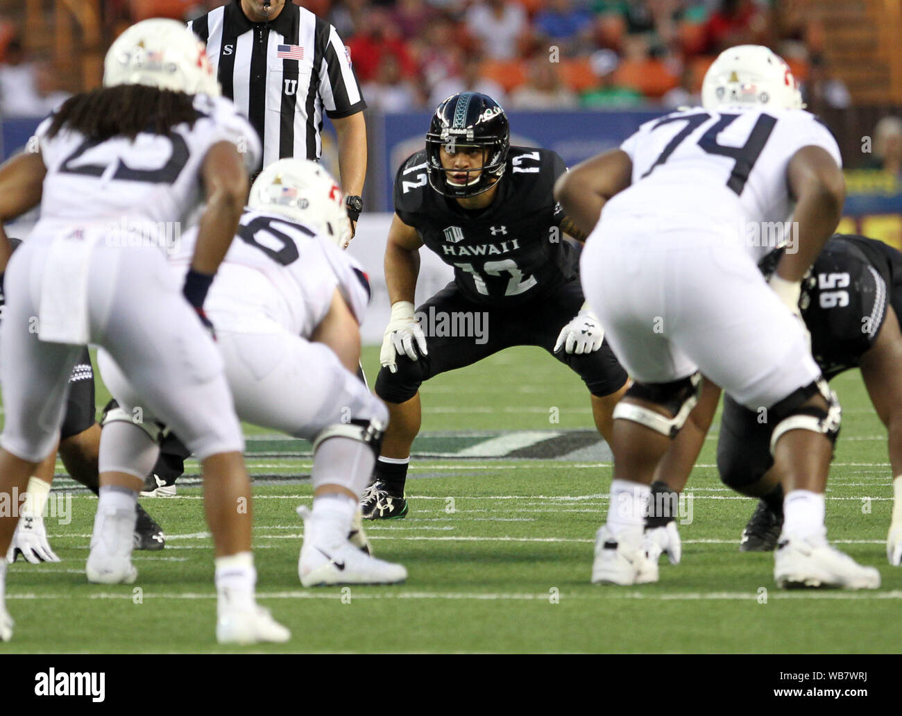 Honolulu, Hawaii, USA. 24 août, 2019. Bâle, Suisse. Août 25, 2019. AHawaii Rainbow Warriors linebacker Kana'je Picanco # 12 pendant le jeu entre l'Hawaii Rainbow Warriors et les Wildcats de l'Arizona à l'Aloha Stadium d'Honolulu, HI - Michael Sullivan/CSM Crédit : Cal Sport Media/Alamy Live News Crédit : Cal Sport Media/Alamy Live News Crédit : Cal Sport Media/Alamy Live News Crédit : Cal Sport Media/Alamy Live News Banque D'Images