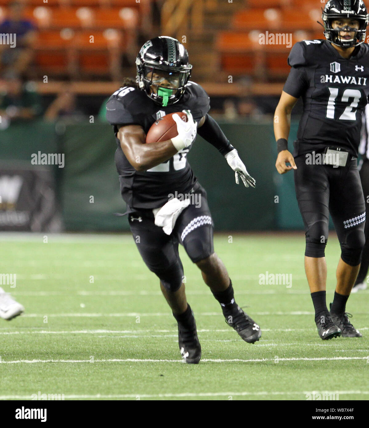 Honolulu, Hawaii, USA. 24 août, 2019. AHawaii Rainbow Warriors Miles running back # 26 Reed pendant le jeu entre l'Hawaii Rainbow Warriors et les Wildcats de l'Arizona à l'Aloha Stadium d'Honolulu, HI - Michael Sullivan/CSM Crédit : Cal Sport Media/Alamy Live News Crédit : Cal Sport Media/Alamy Live News Crédit : Cal Sport Media/Alamy Live News Banque D'Images