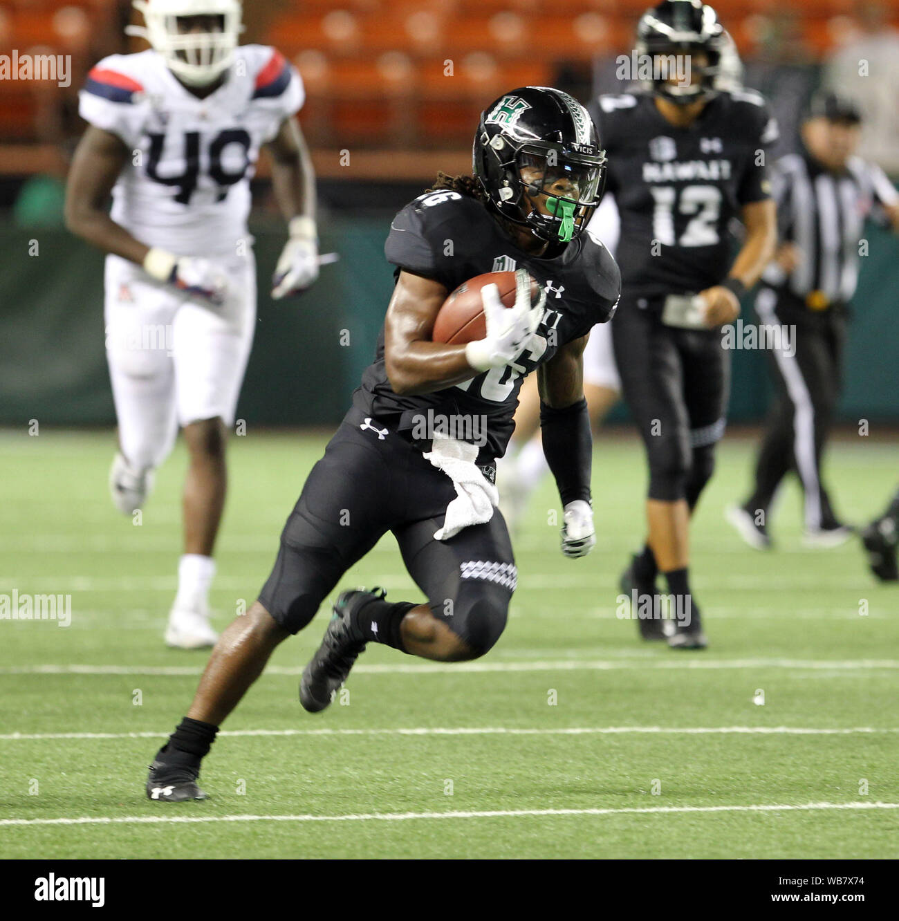 Honolulu, Hawaii, USA. 24 août, 2019. AHawaii Rainbow Warriors Miles running back # 26 Reed pendant le jeu entre l'Hawaii Rainbow Warriors et les Wildcats de l'Arizona à l'Aloha Stadium d'Honolulu, HI - Michael Sullivan/CSM Crédit : Cal Sport Media/Alamy Live News Crédit : Cal Sport Media/Alamy Live News Crédit : Cal Sport Media/Alamy Live News Banque D'Images