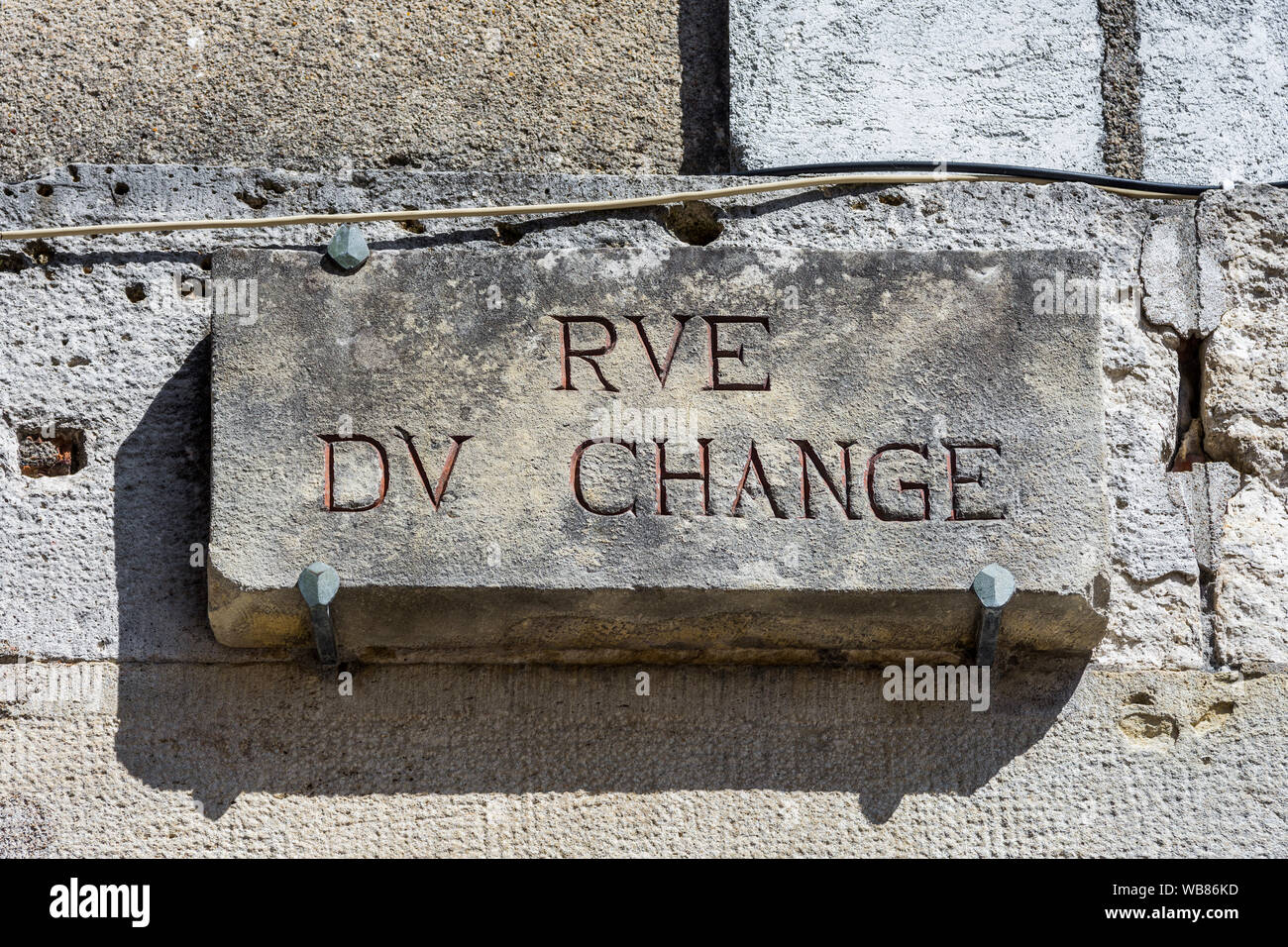 'Rue du changement" en pierre de street sign, Tours, Indre-et-Loire, France. Banque D'Images