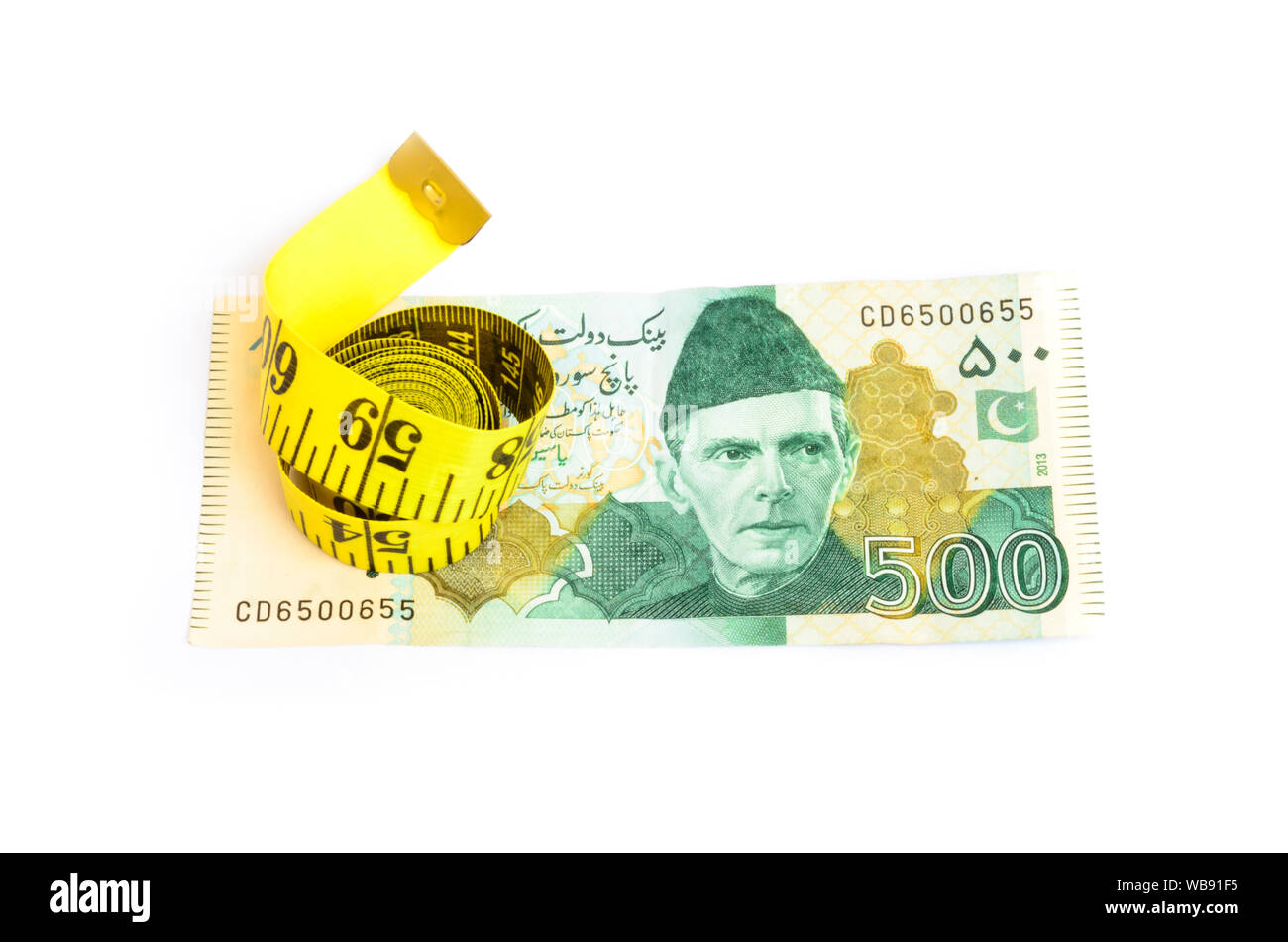 Libre de cinq cents monnaie pakistanaise Roupie bill et mesurer tape Banque D'Images