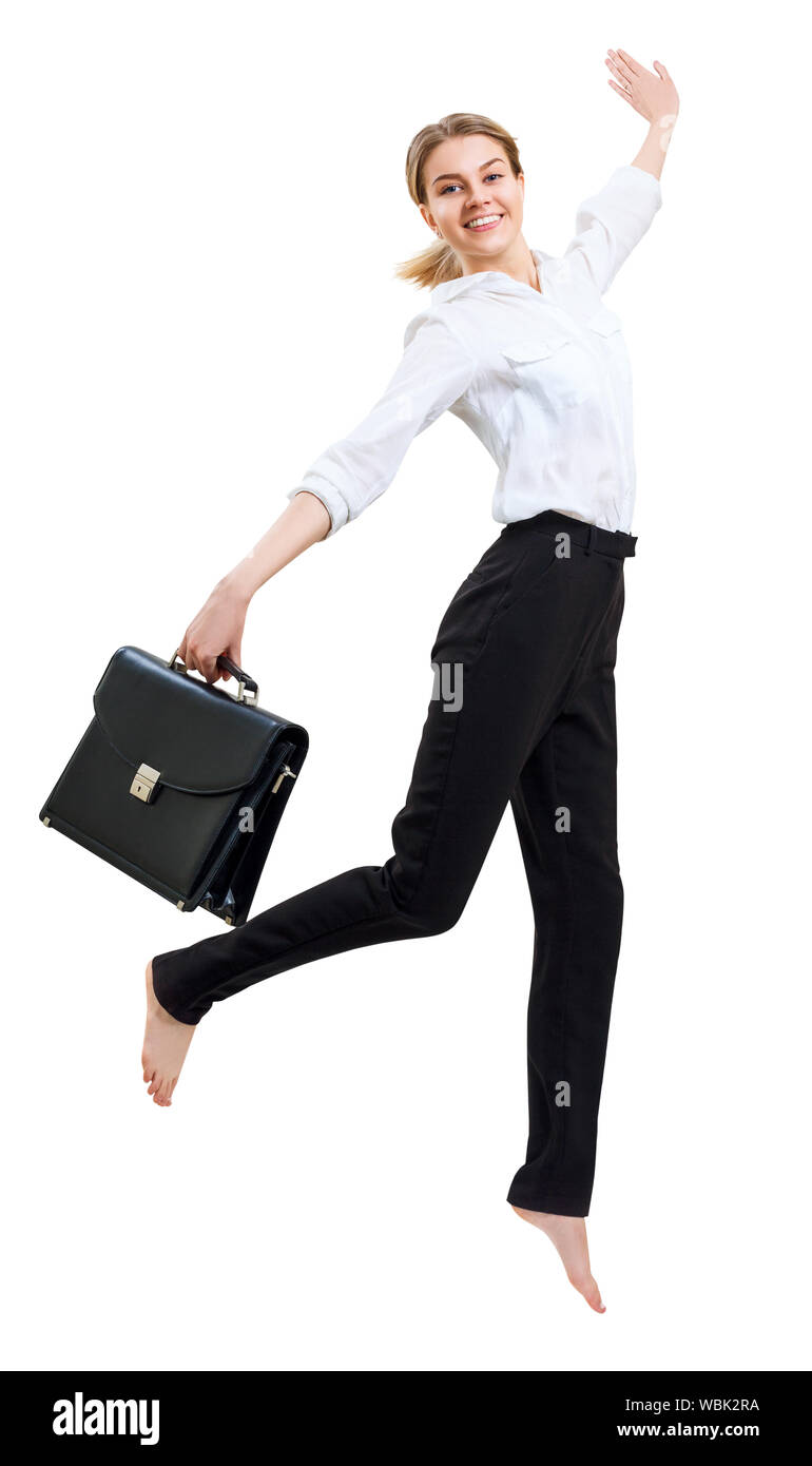 Happy young business woman en saut d'usure formelle avec porte-documents. Isolé sur fond blanc. Banque D'Images