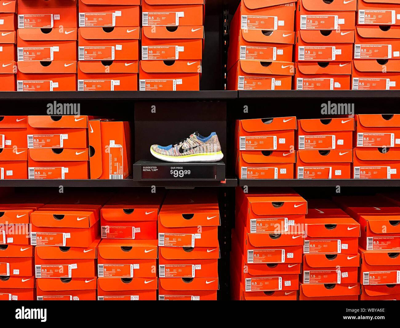 Nike chaussures d'entraînement affichage dans un magasin Nike. Banque D'Images