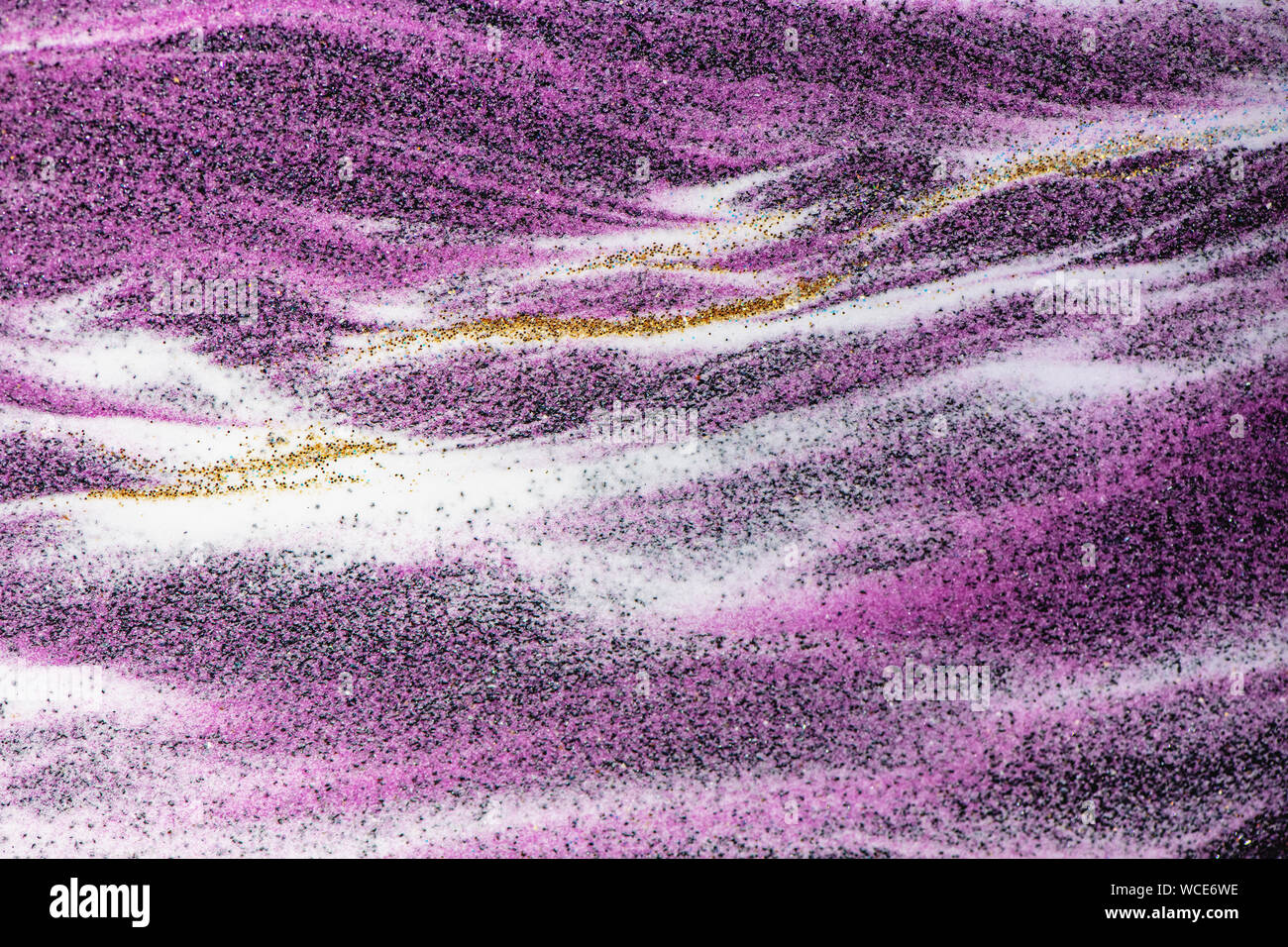 La texture du sable de quartz de Couleur fond abstrait, noir, blanc, Or et pourpre. Banque D'Images