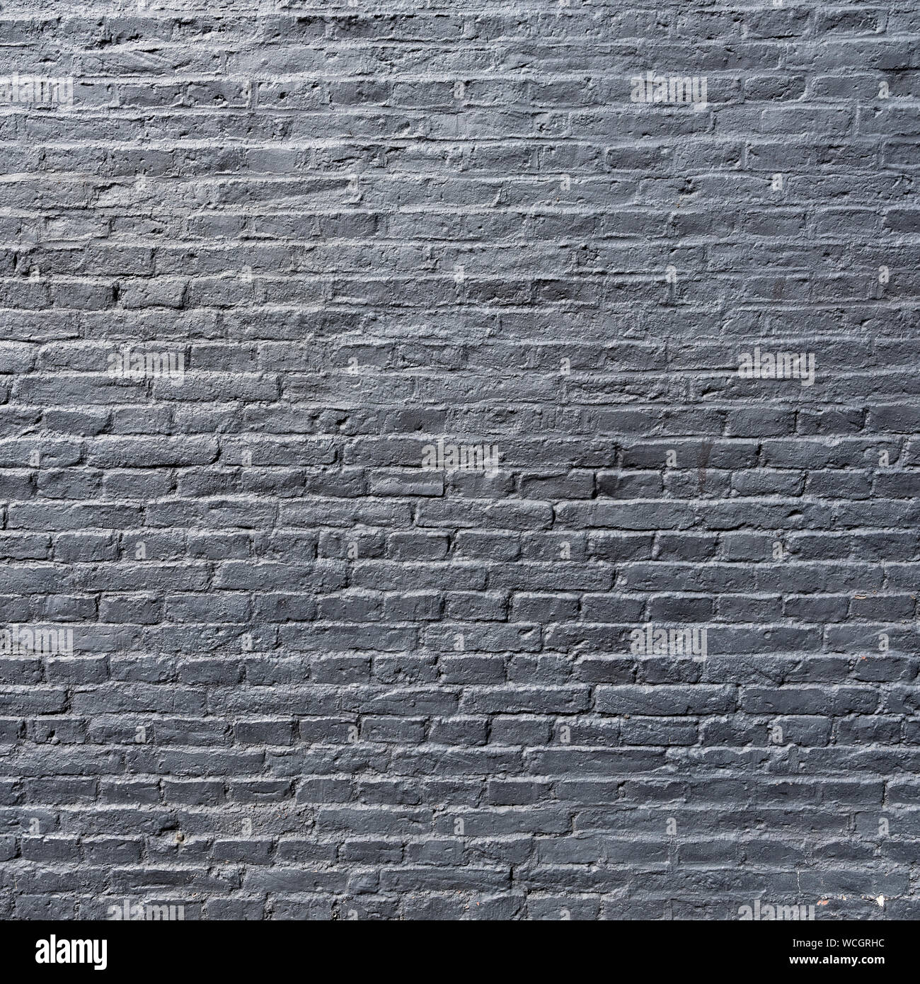 Une partie de mur de briques peint gris argent Banque D'Images