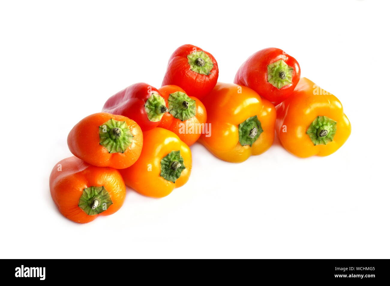 Poivron rouge et jaune fruits isolé sur fond blanc Banque D'Images