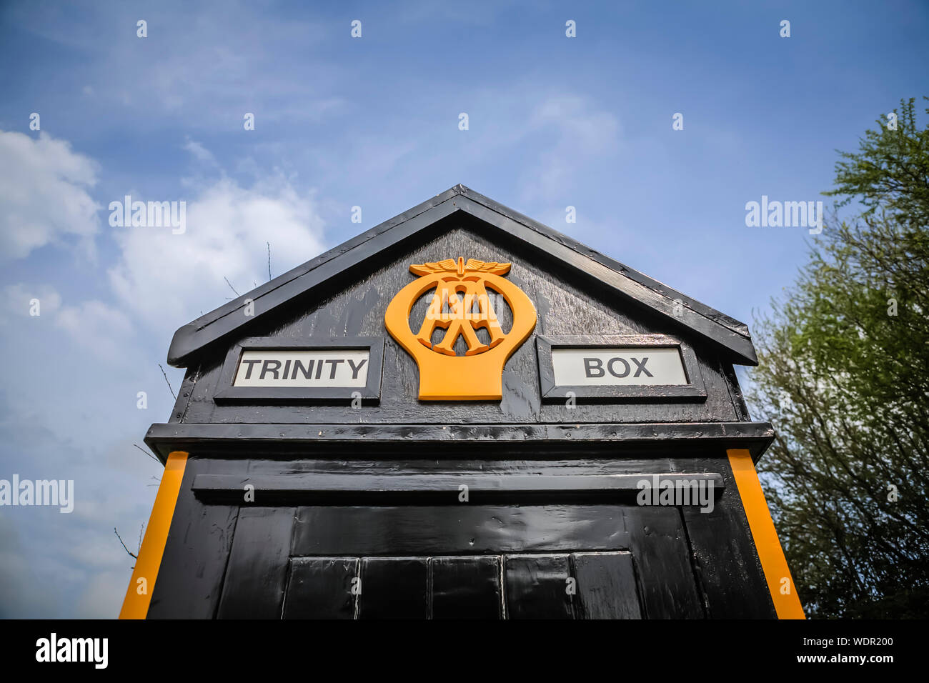 Vieux bois Automobile Association AA téléphone fort sur l'île de Jersey, l'Île Channel Banque D'Images