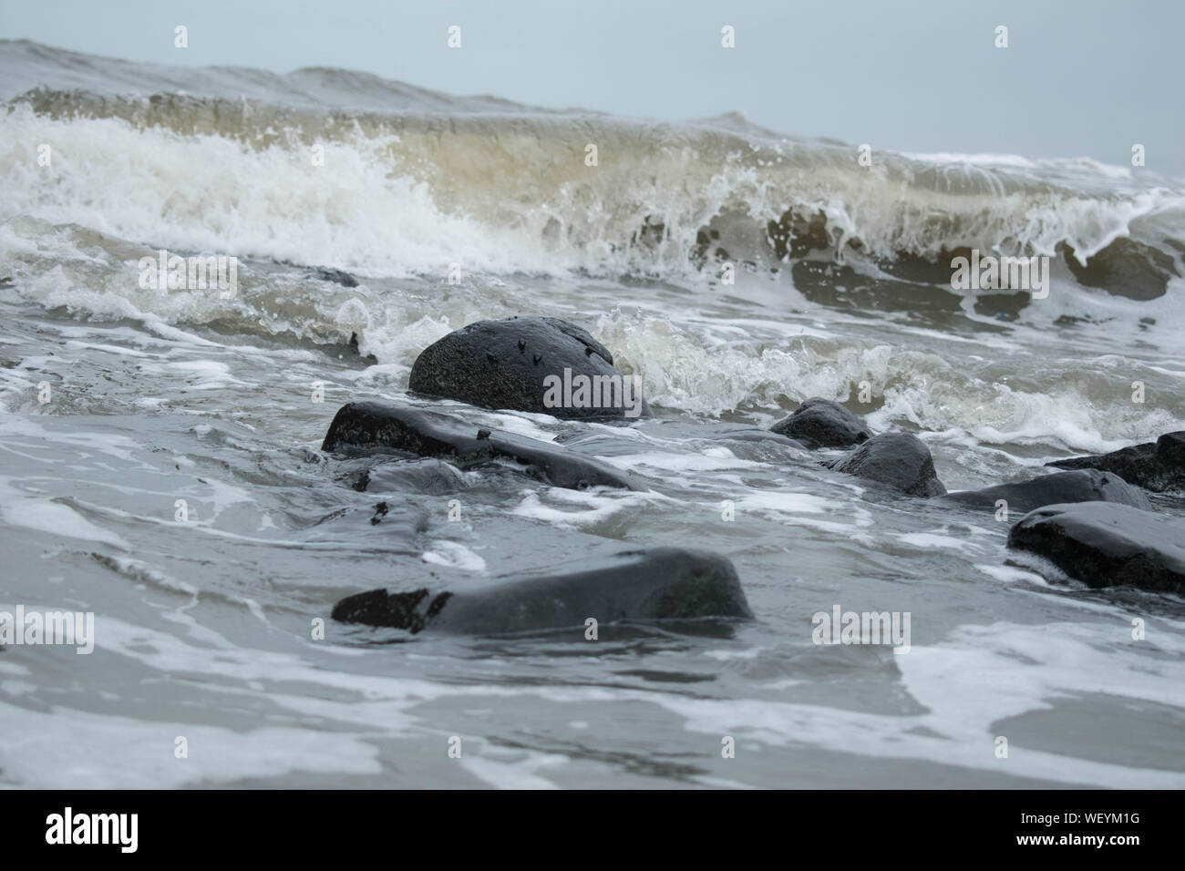 Rock formation sur une plage de Goa Banque D'Images