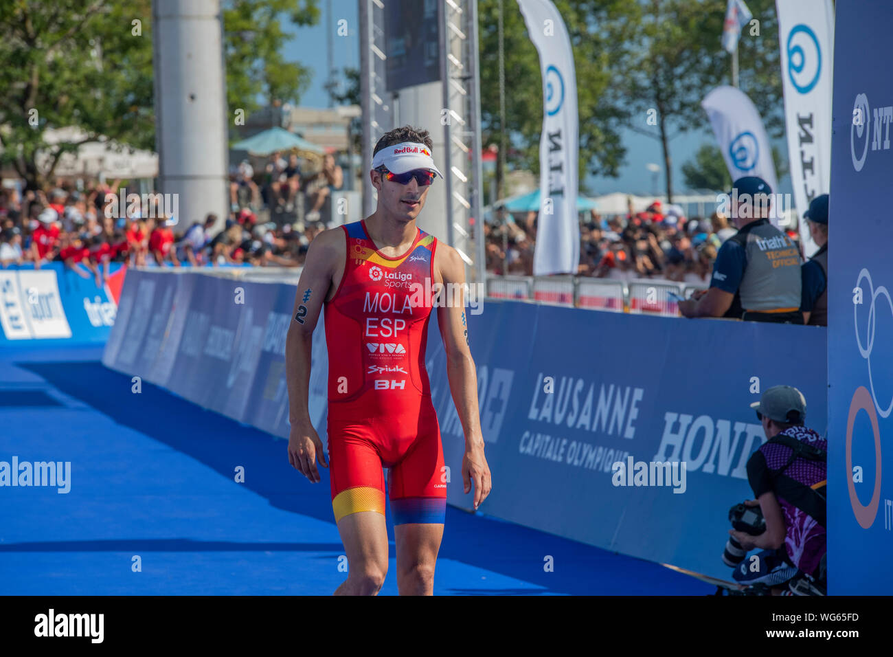 Lausanne, Suisse. Août 31, 2019. Lausanne, Suisse - 2019/08/29 : triathlète espagnol Mario Mola de franchir la ligne d'arrivée de l'ITU World Triathlon Lausanne (photo de Eric Dubost/Pacific Press) Credit : Pacific Press Agency/Alamy Live News Banque D'Images