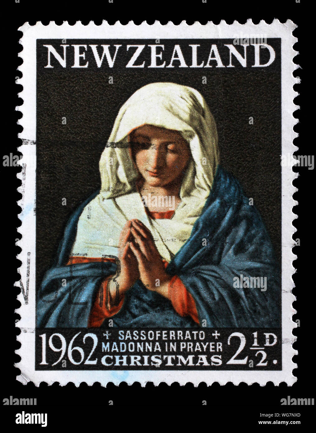 Timbre émis en Nouvelle-Zélande montre priant Madonna, série Noël, vers 1962. Banque D'Images