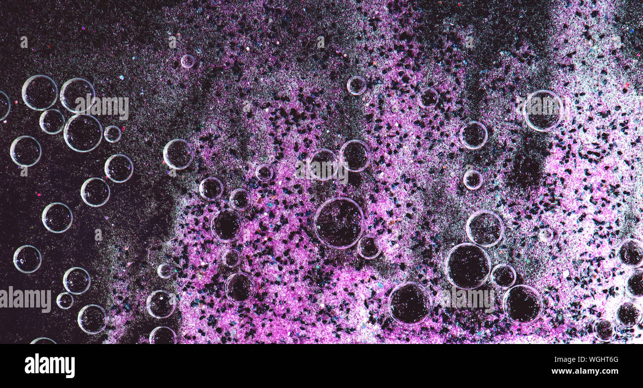 Résumé fond avec sable de quartz coloré et des bulles d'air. Banque D'Images