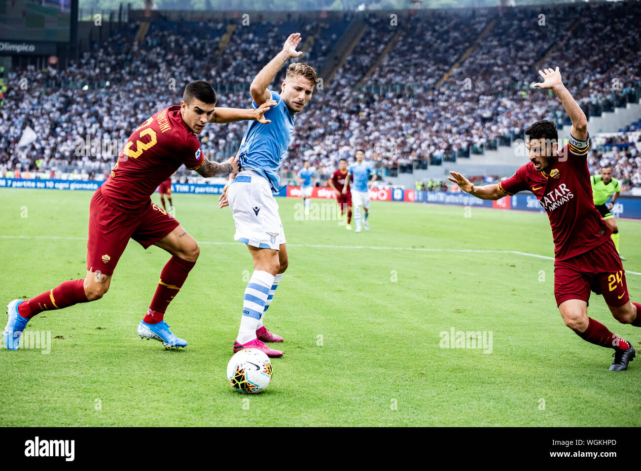 Ciro immobile de Latium, Ganluca Mancini et Alessandro Florenzi comme des Roms en action pendant le match de Serie A entre le Latium et l'AS Roma au stade olympique.(score final : Lazio 1:1 AS Roma) Banque D'Images