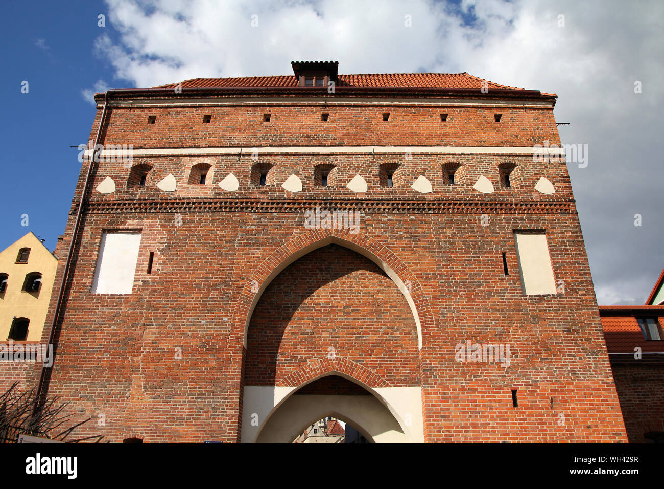 Pologne - Torun, ville divisée par la rivière Vistule entre occidentale et Kuyavia régions. Fortification de la vieille ville - la porte. La vieille ville médiévale est une une Banque D'Images