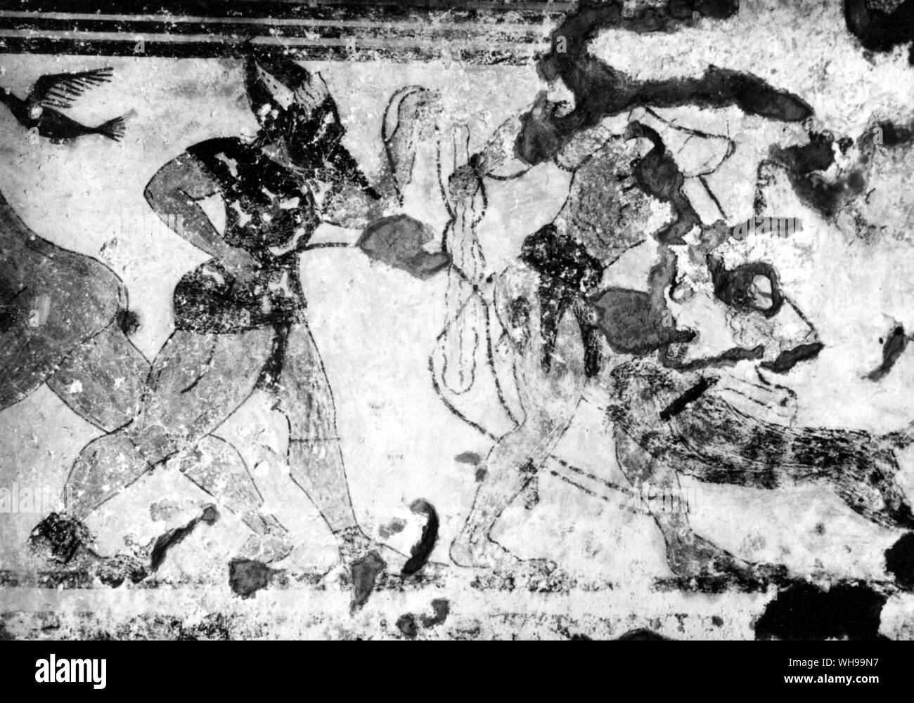 L'homme aux yeux bandés par un chien appâtés et l'exemple de la cité étrusque de type combat de gladiateurs qui plus tard les Romains ont adopté. La peinture est de la tombe de l'Augure Tarquinia 530 av. Banque D'Images