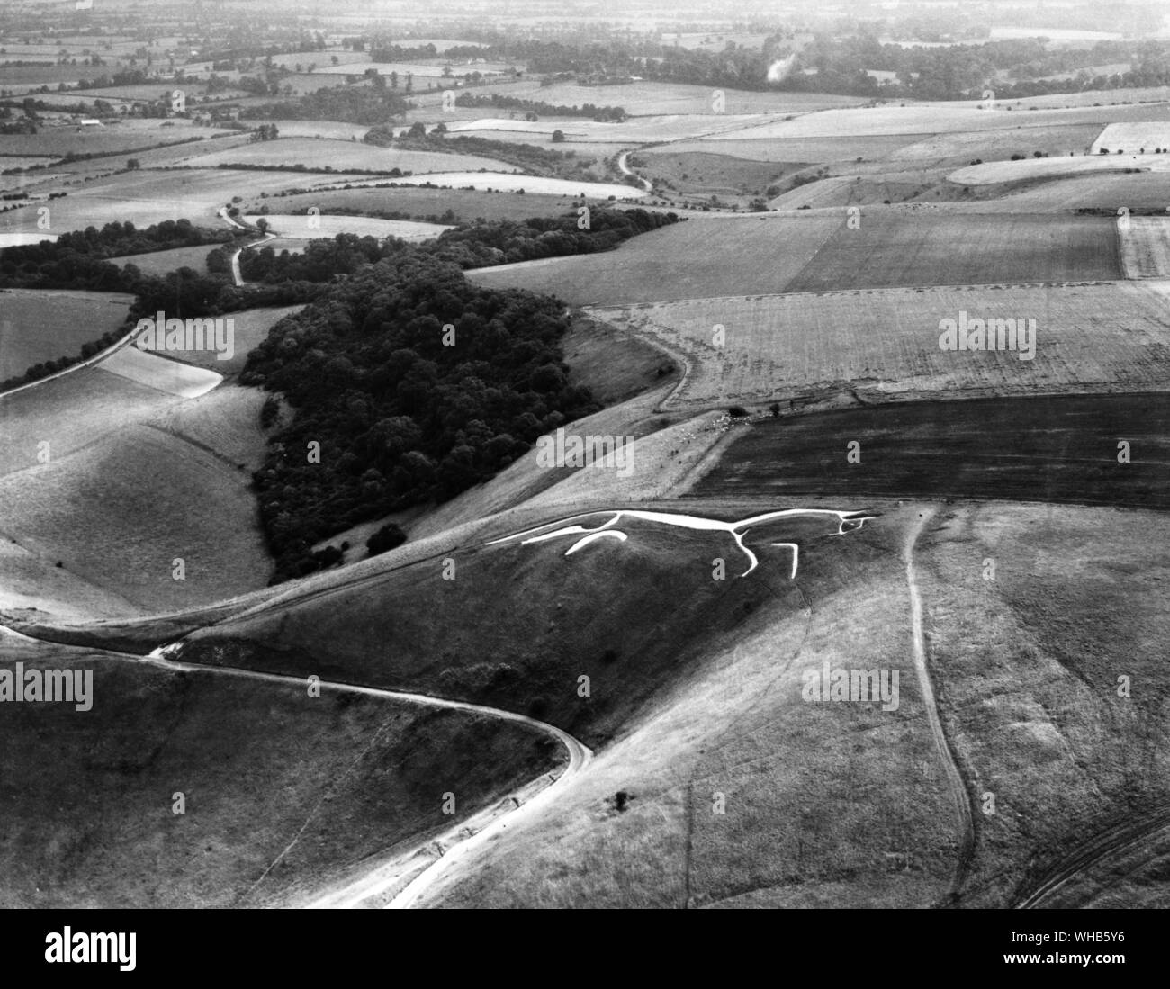L'Uffington White Horse se tenir au milieu de l'œil du cheval et faire un voeu Banque D'Images