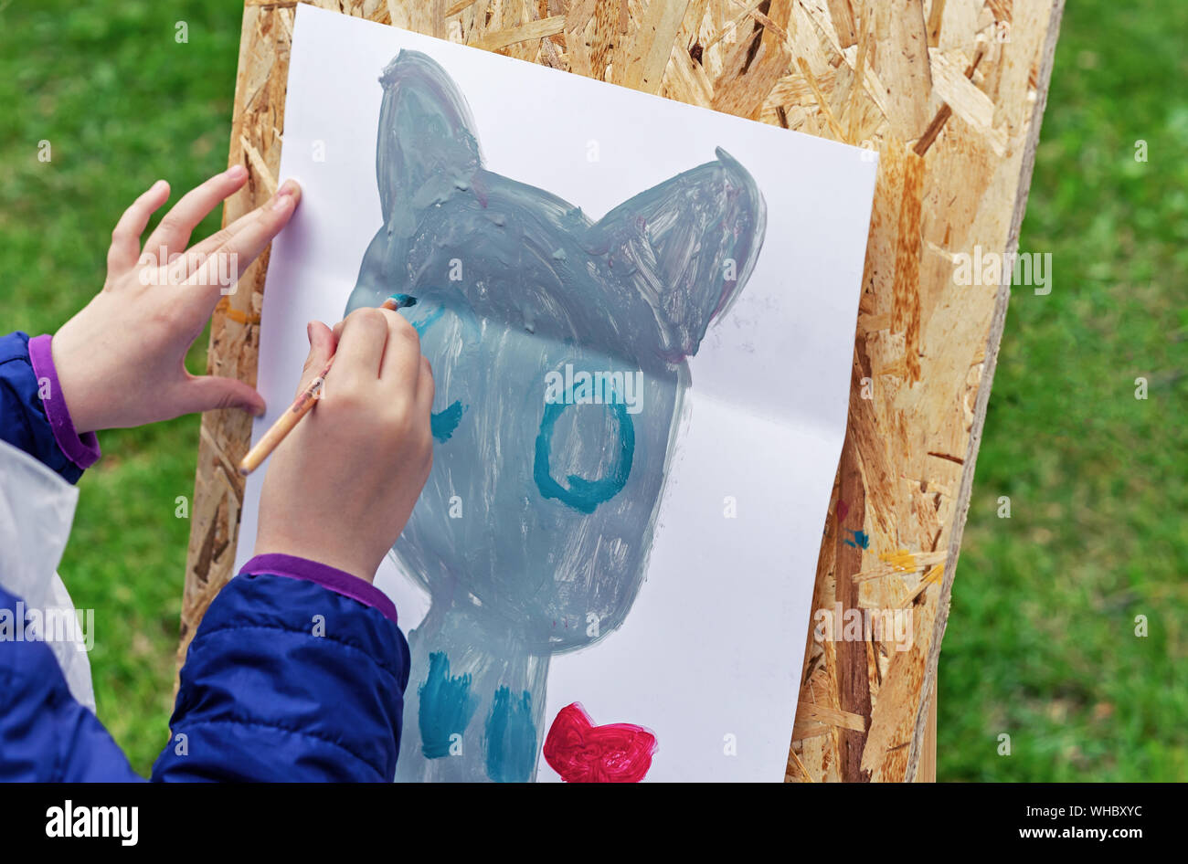 Pour l'encombrement d'un chat. Les peintures de fille un chat à l'aquarelle. Banque D'Images