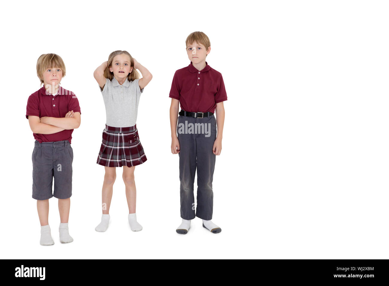 Portrait of school friends Standing together over white background Banque D'Images