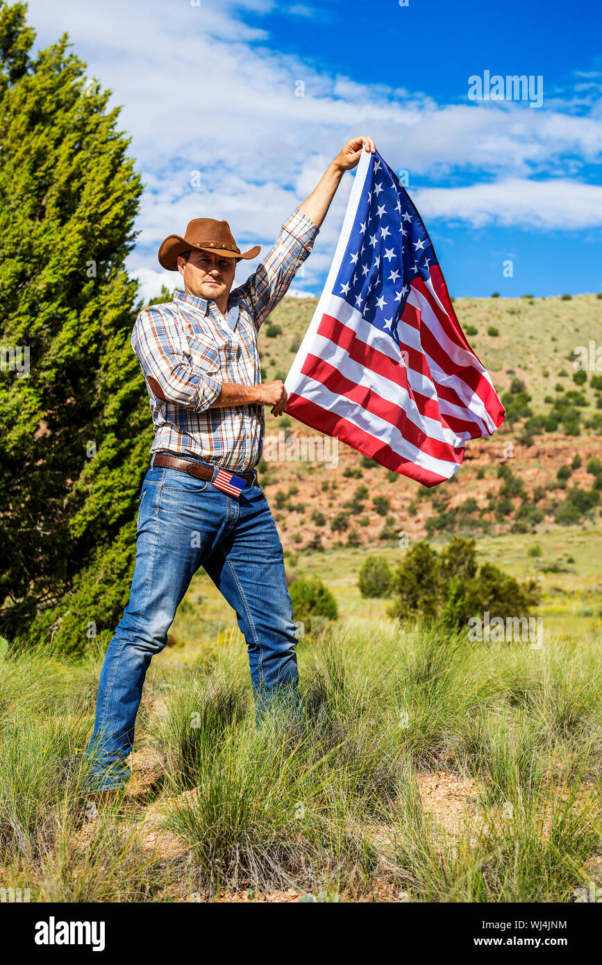 Sud-ouest - un cowboy prend du temps pour se reposer et réfléchir. Banque D'Images