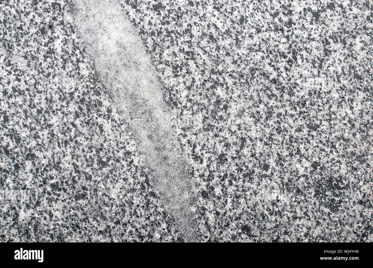 Arrière-plan de granit gris pierre naturelle. Texture granit matériau de revêtement. Texture de fond de granit gris. Granit gris solide texture. Copier l'espace. Banque D'Images