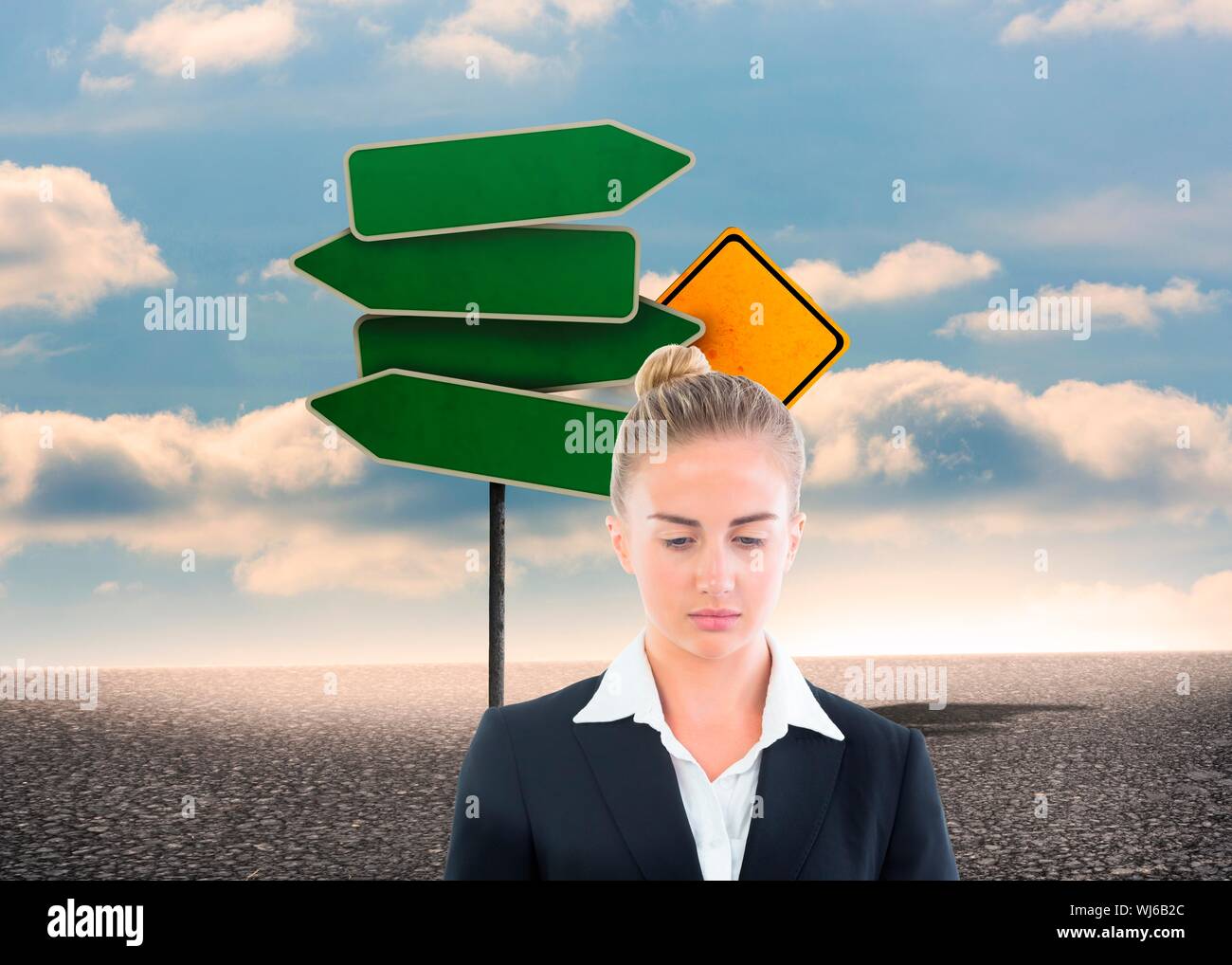 Image composite de blond businesswoman looking thoughtful en face de la signalisation routière Banque D'Images