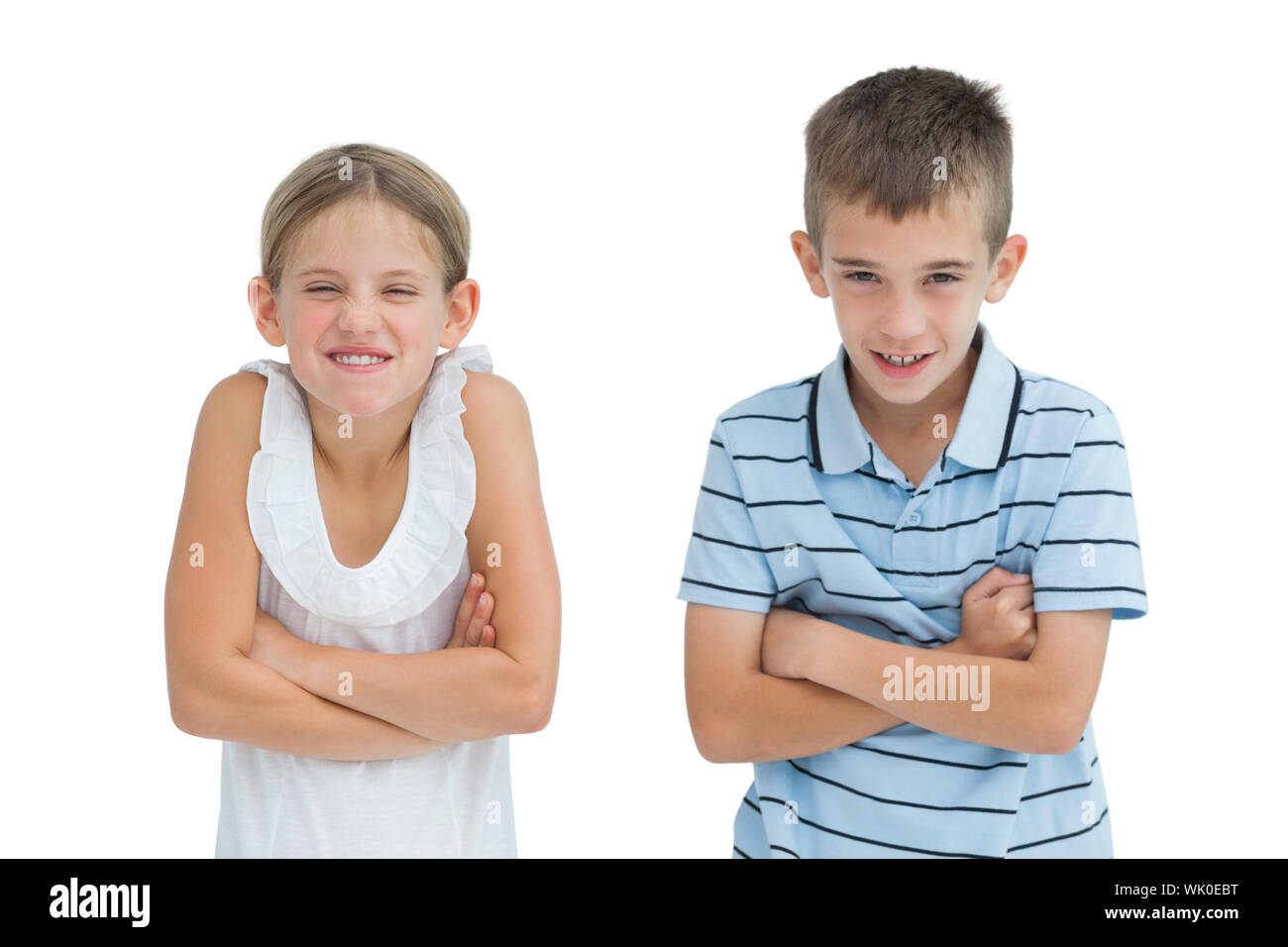 Smiling brother and sister posing together Banque D'Images