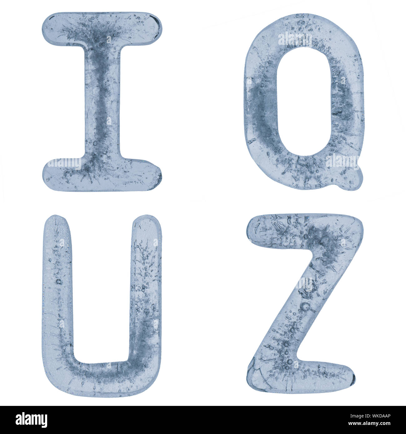 Les lettres Q, U, I et Z d'un alphabet fait de glace. Banque D'Images