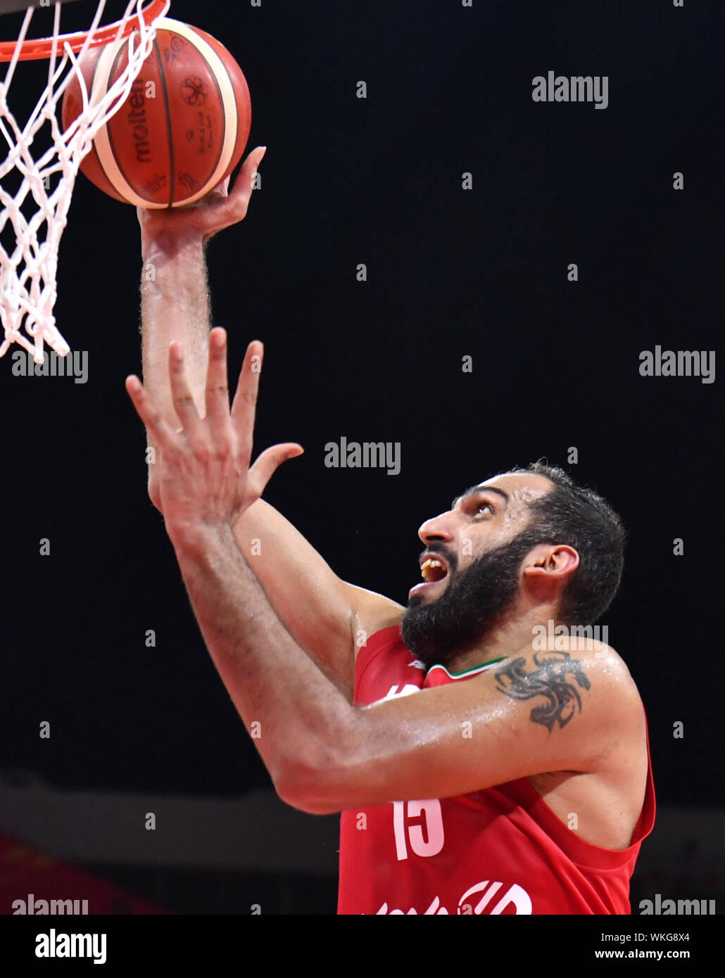 Guangzhou, la province chinoise du Guangdong. 16Th Jun 2019. Hamed Haddadi d'Iran va jusqu'à le panier pendant la match du groupe C entre l'Espagne et l'Iran à la FIBA 2019 Coupe du Monde à Guangzhou, capitale du sud de la province chinoise du Guangdong, le 4 septembre 2019. Il Crédit : Summer Palace/Xinhua/Alamy Live News Banque D'Images