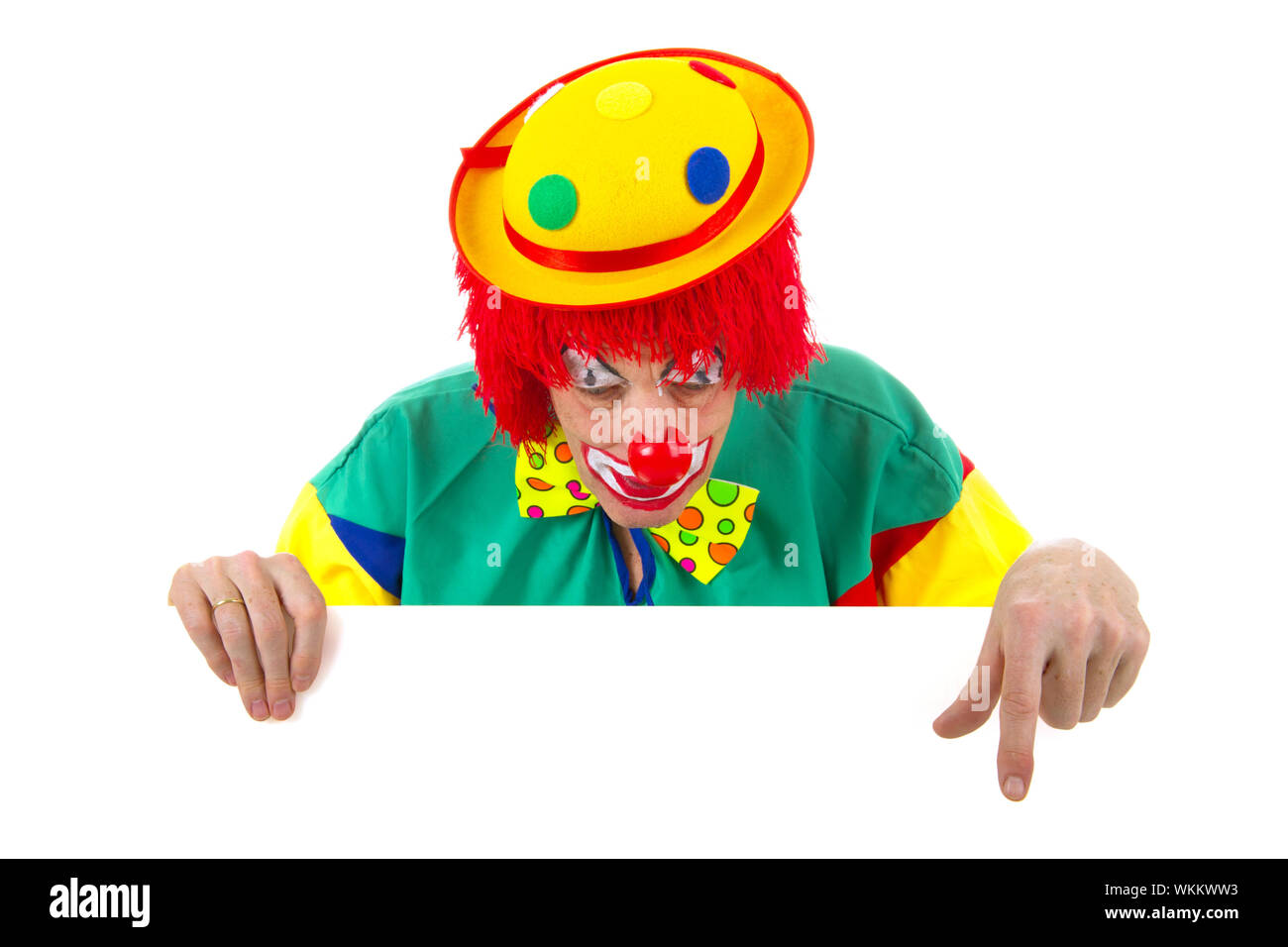 Clown avec une carte blanche à pointage texte youre Banque D'Images