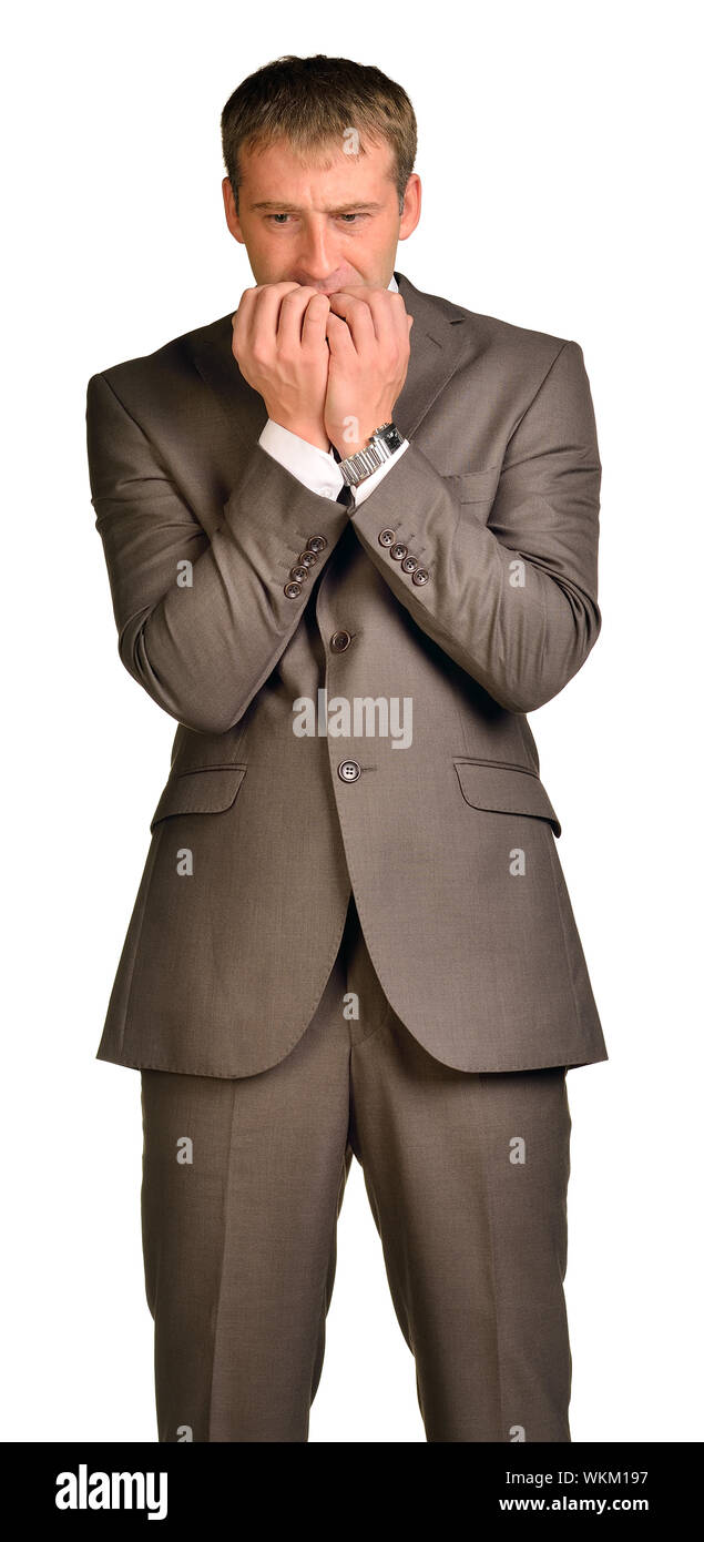 Homme d'affaires avait de gros problèmes. Isolé sur fond blanc Banque D'Images