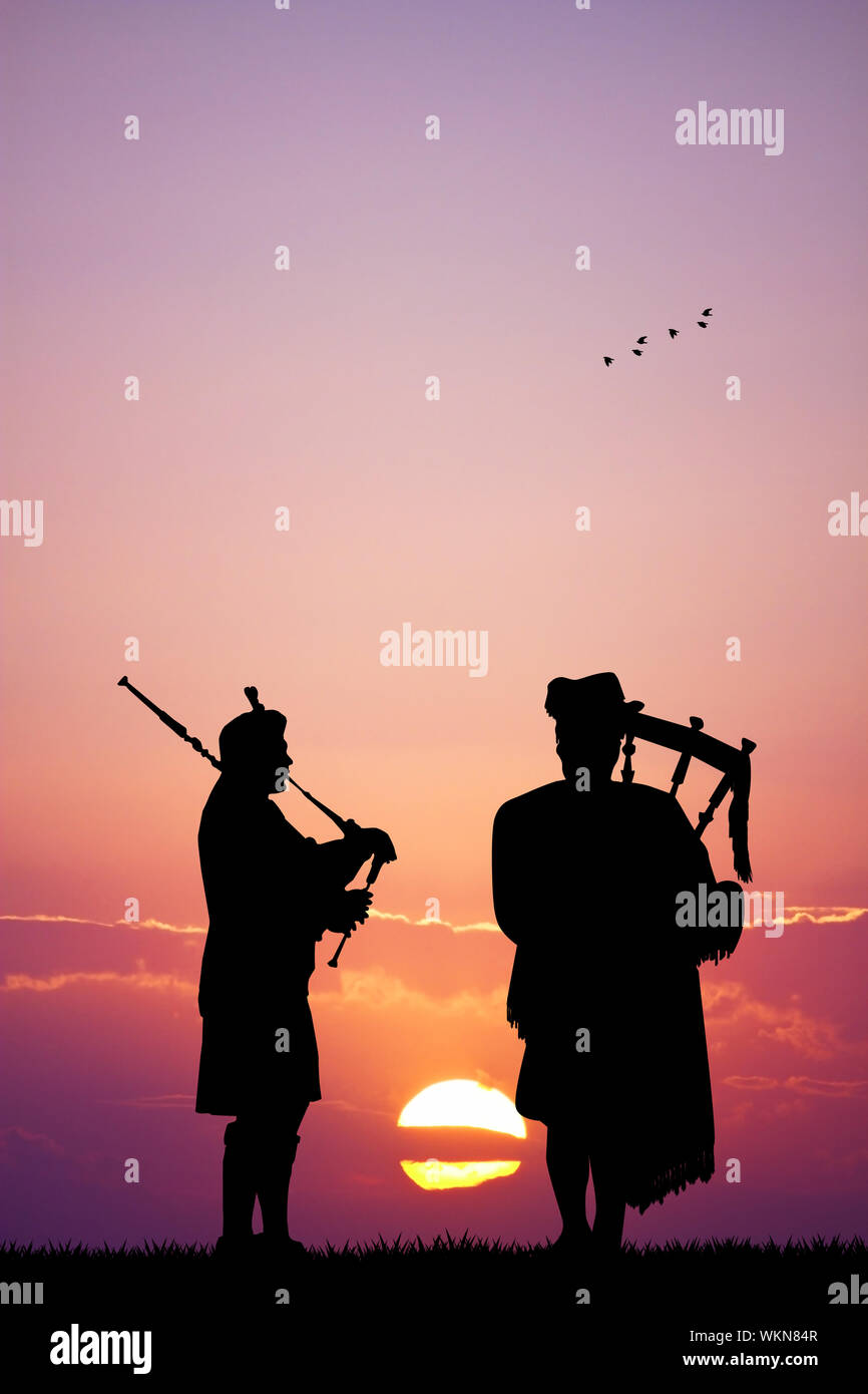 Pipers at sunset Banque D'Images