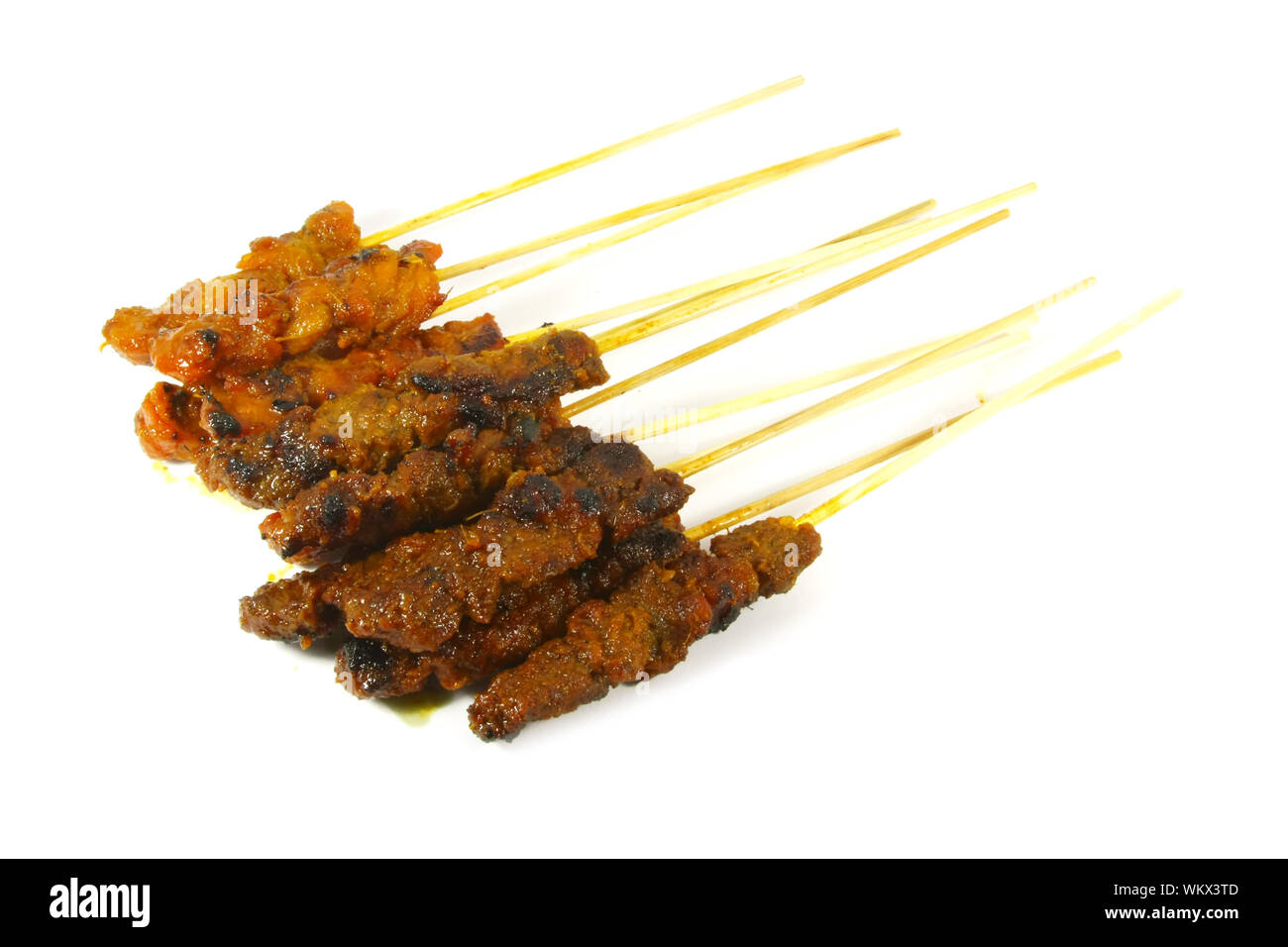 Brochettes de viande grillées sur des tiges de bambou Banque D'Images