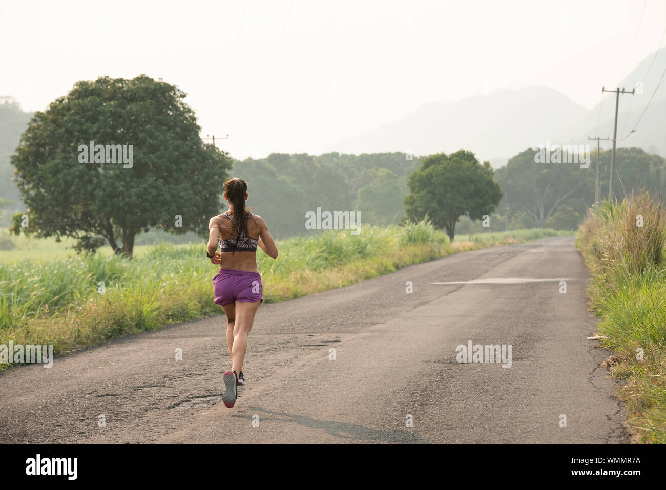 Un coureur sur route, à Veracruz, Mexique. Banque D'Images