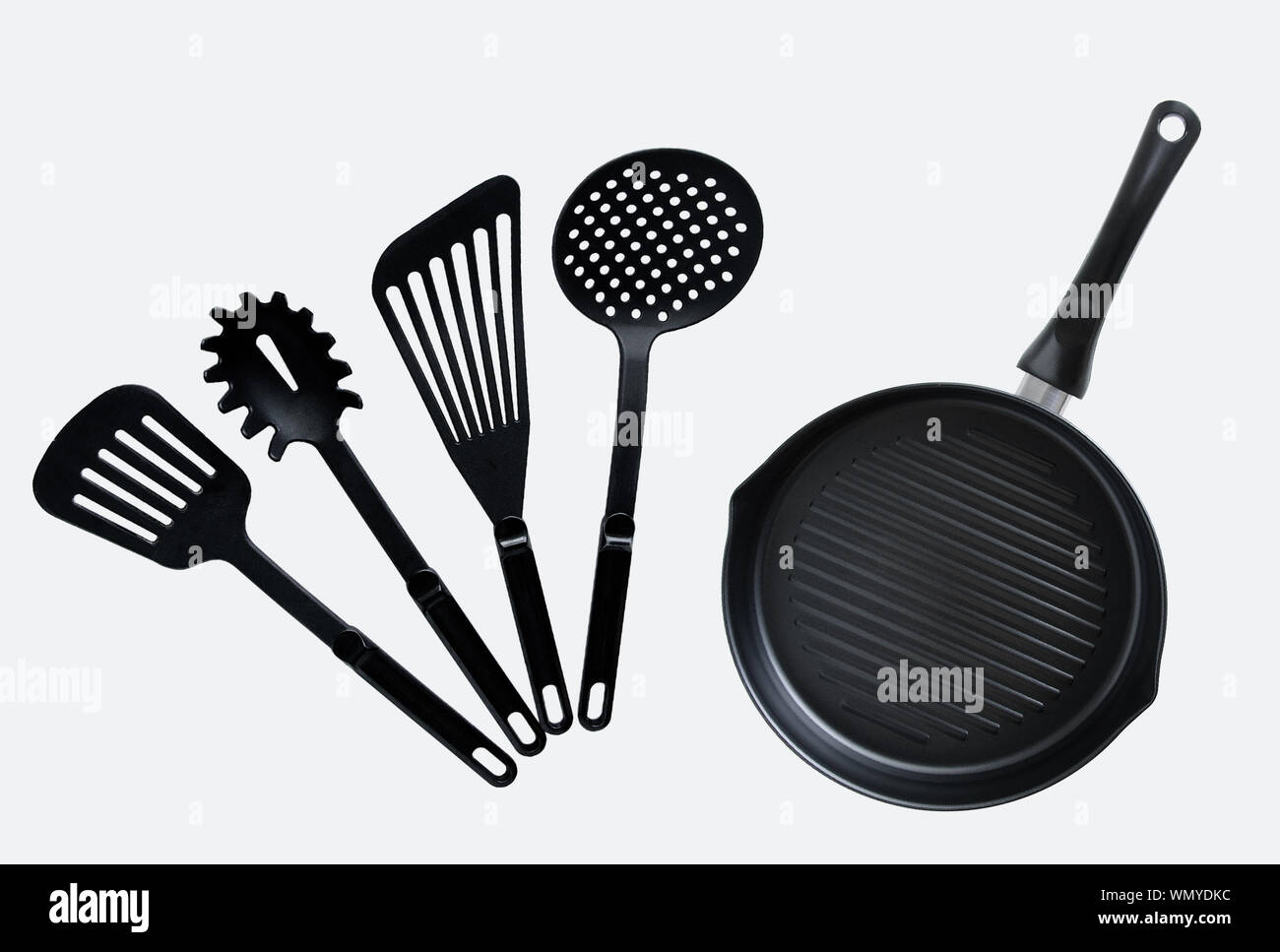 Ensemble de plats noir et une poêle pour la cuisson. Isoler gris Banque D'Images