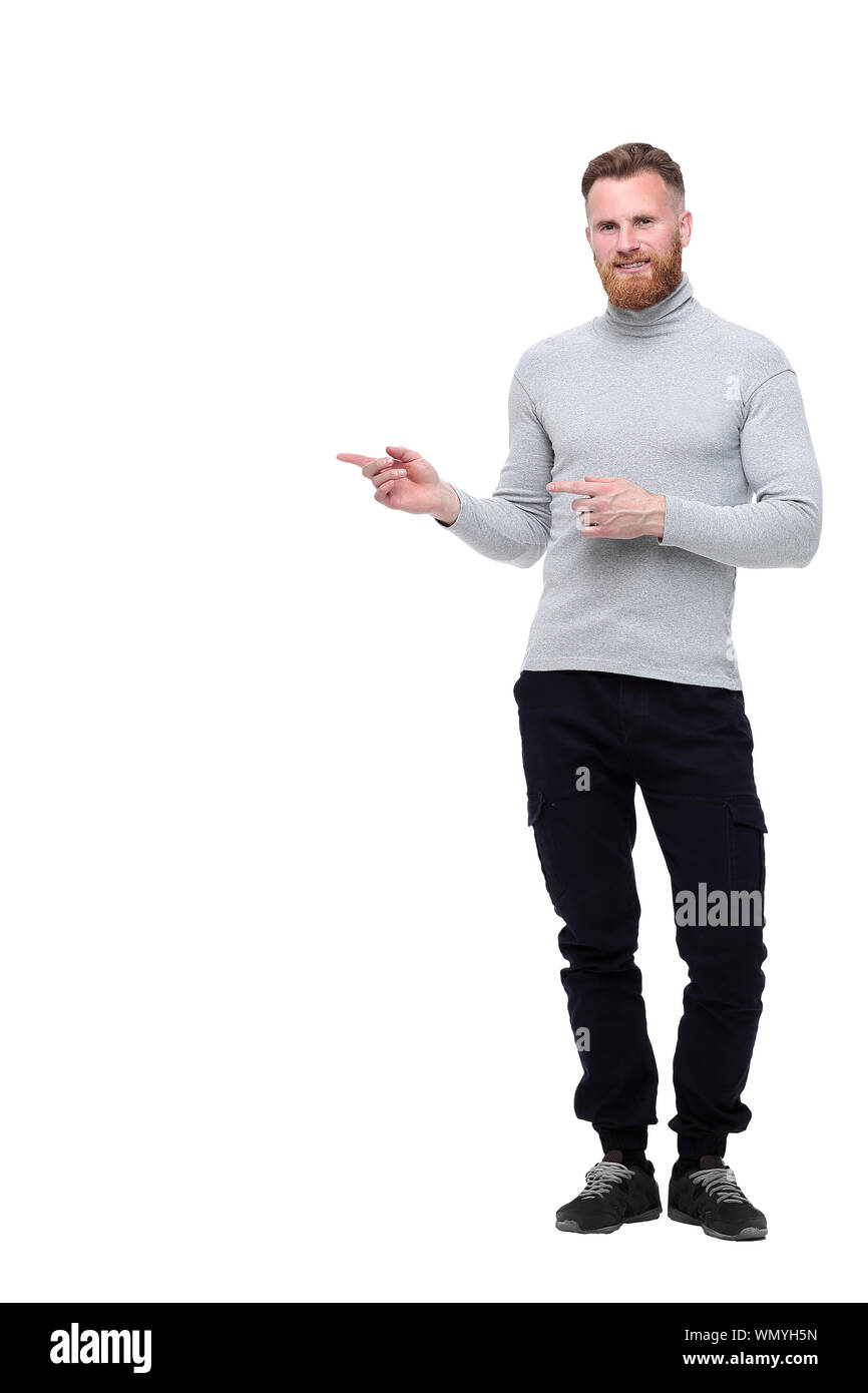 Homme barbu attrayant pointing sur le côté Banque D'Images