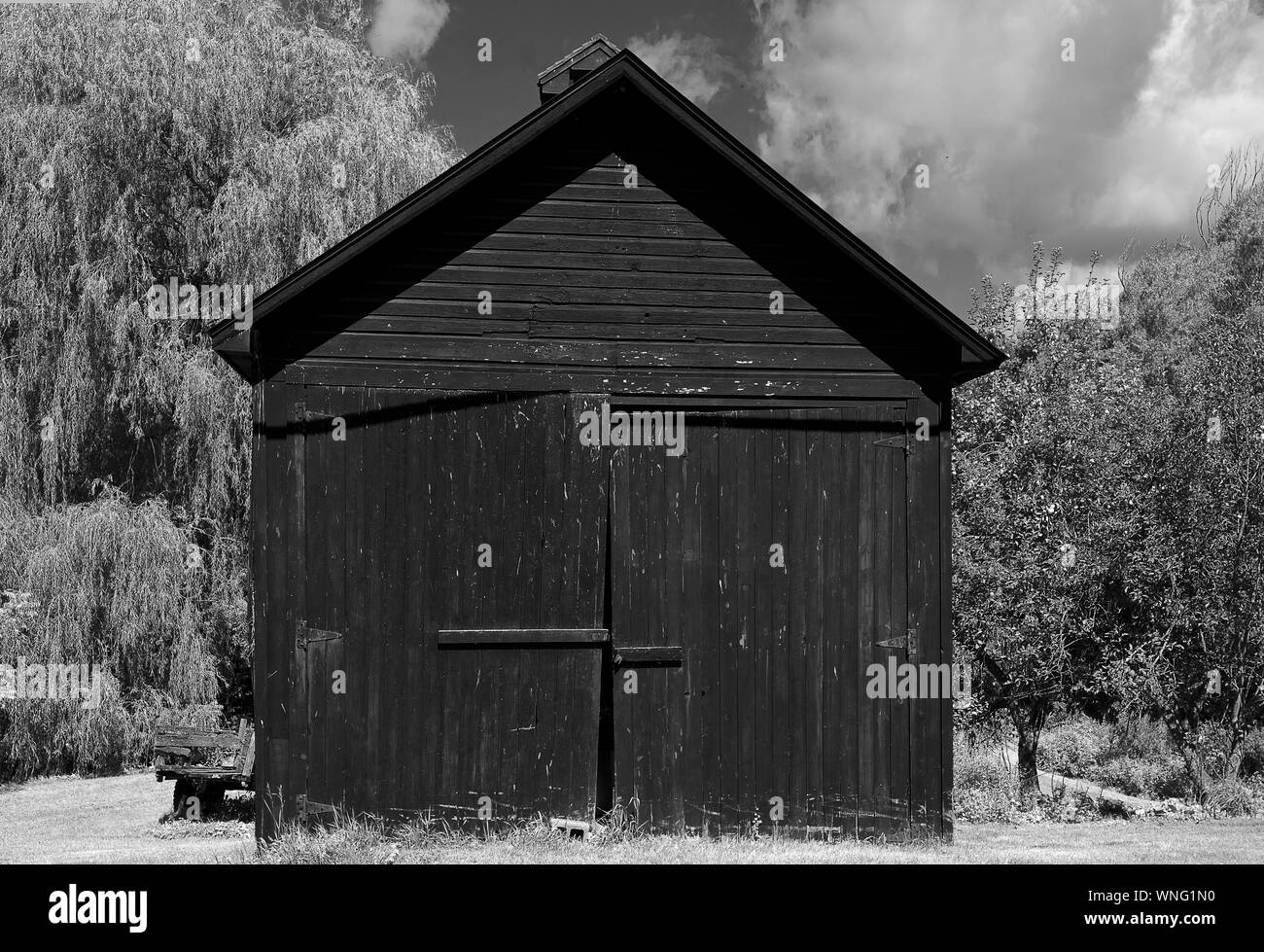 Photo d'une grange dans le nord de New York. Tourné sur une journée d'été en août. Banque D'Images