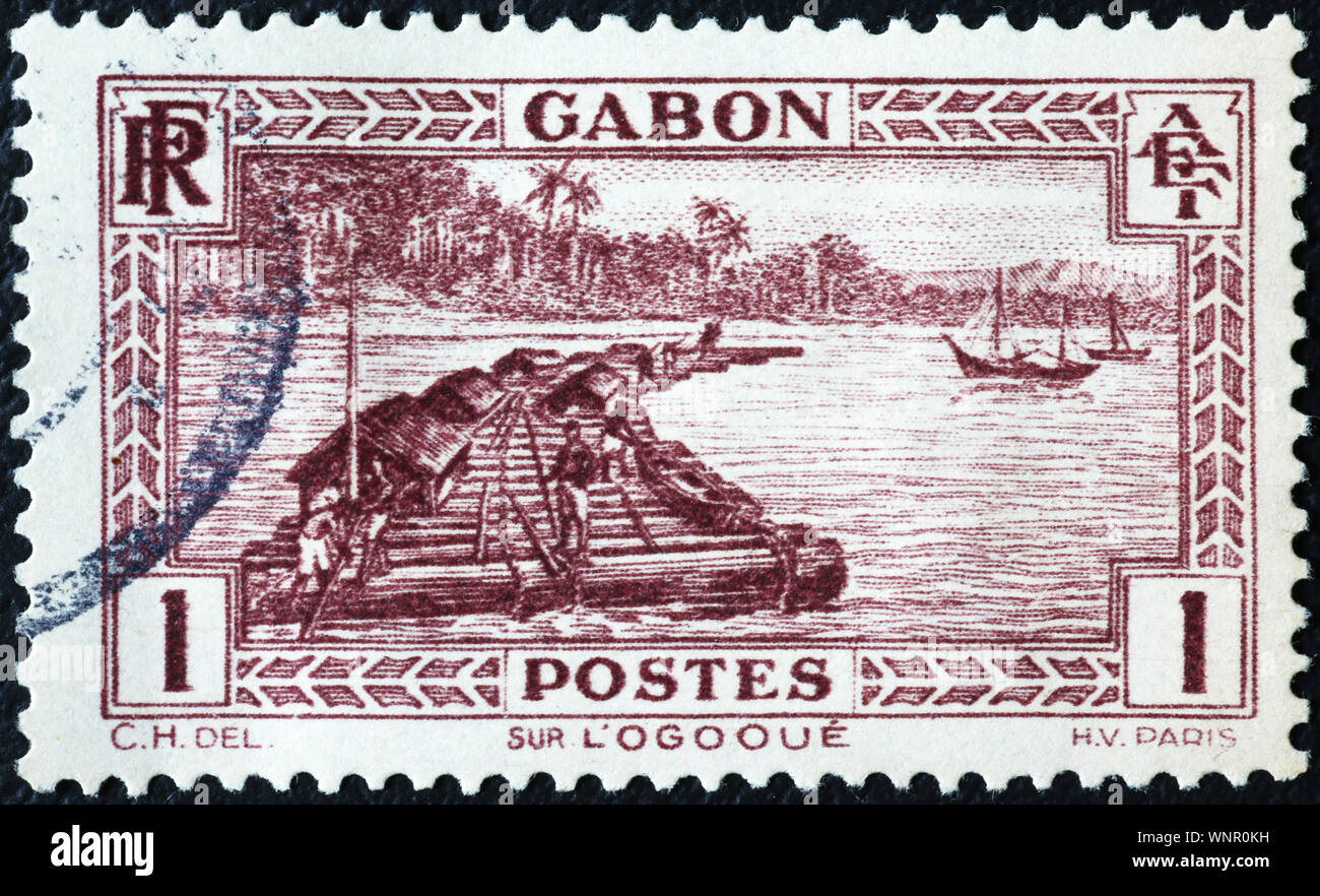 Radeau de billes sur des timbres anciens du Gabon Banque D'Images