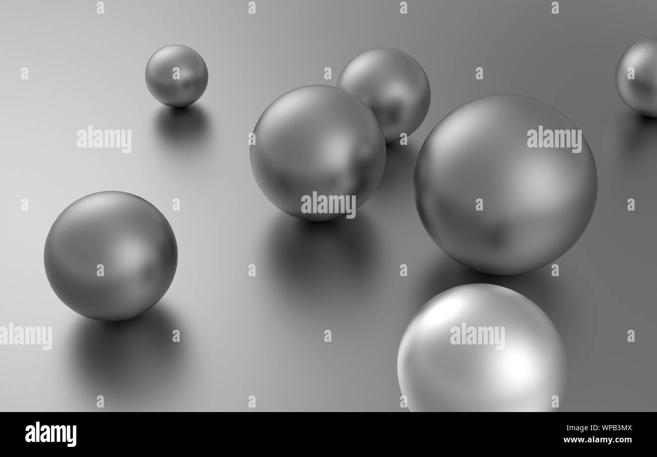 Boules d'argent réparties au hasard sur la surface d'une sphère de différentes tailles. Banque D'Images