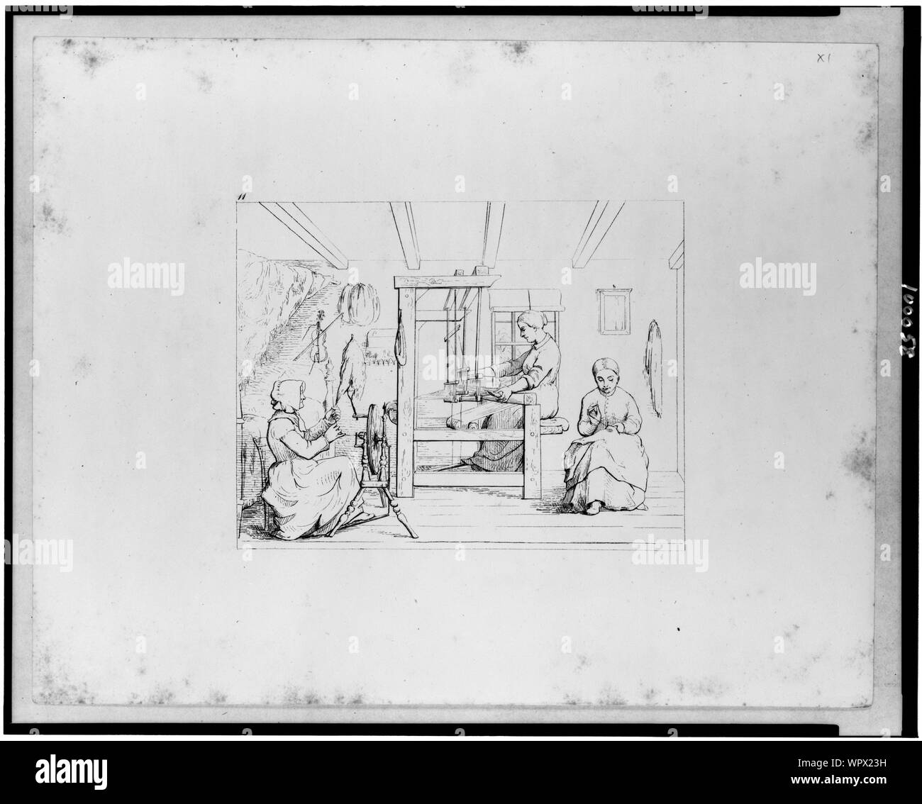 Fabrication de vêtements pour les garçons dans l'armée Banque D'Images