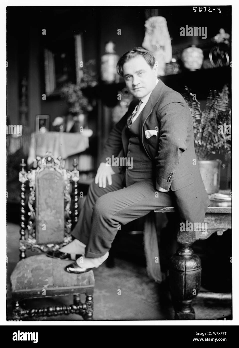 Homme assis Banque D'Images