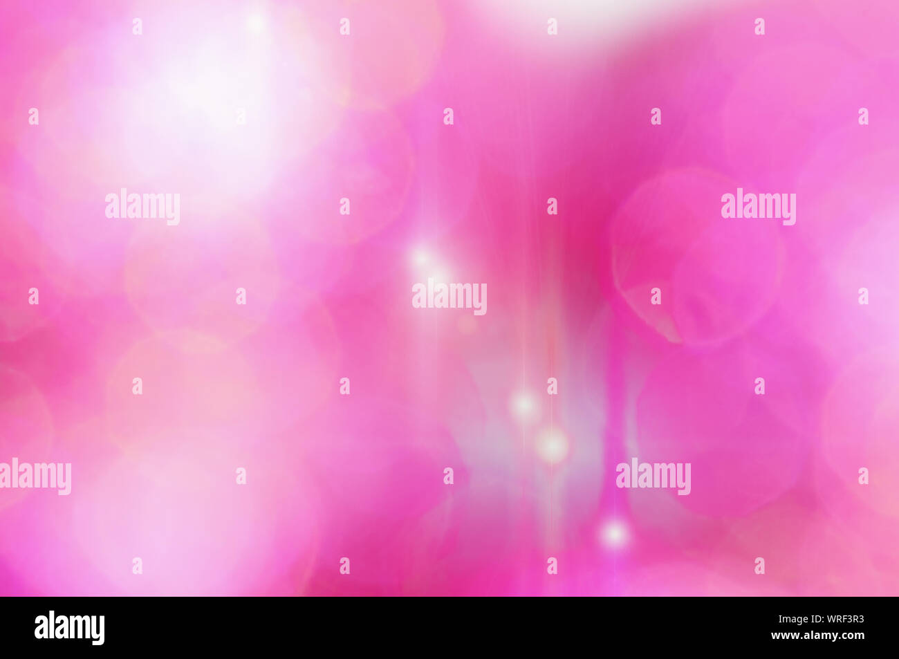 Lumières de Noël rose résumé fond avec bokeh Banque D'Images