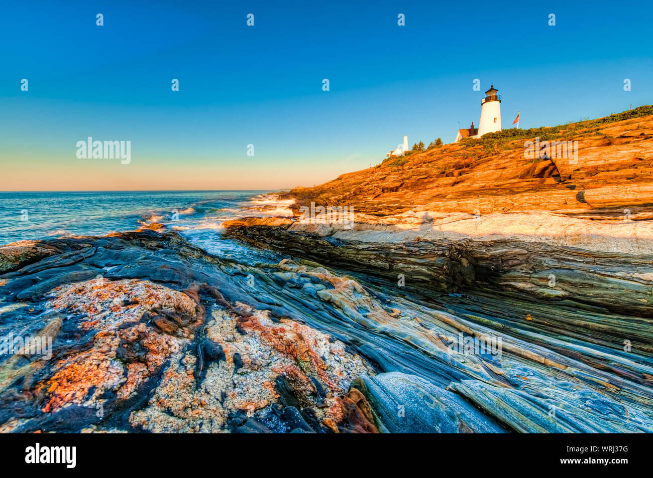 Lever tôt le matin à l'Pemaquid Point Lighthouse dans le Maine, USA. Banque D'Images