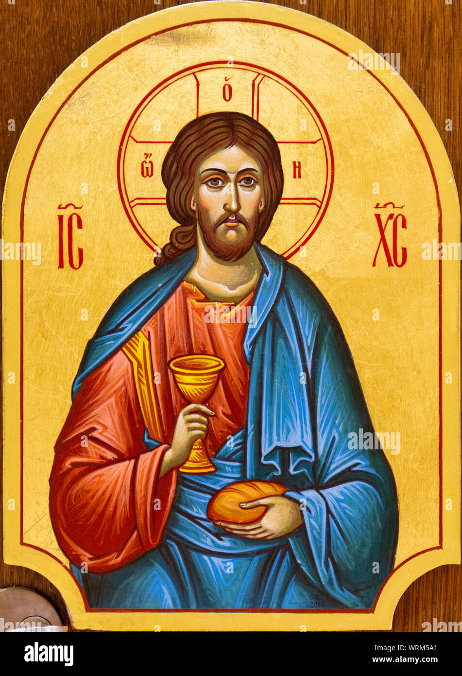 L'icône de Jésus-Christ avec du pain et du vin dans ses mains. L'icône est sur le tabernacle eucharistique. L'église grecque catholique de Saint-Élie. Banque D'Images