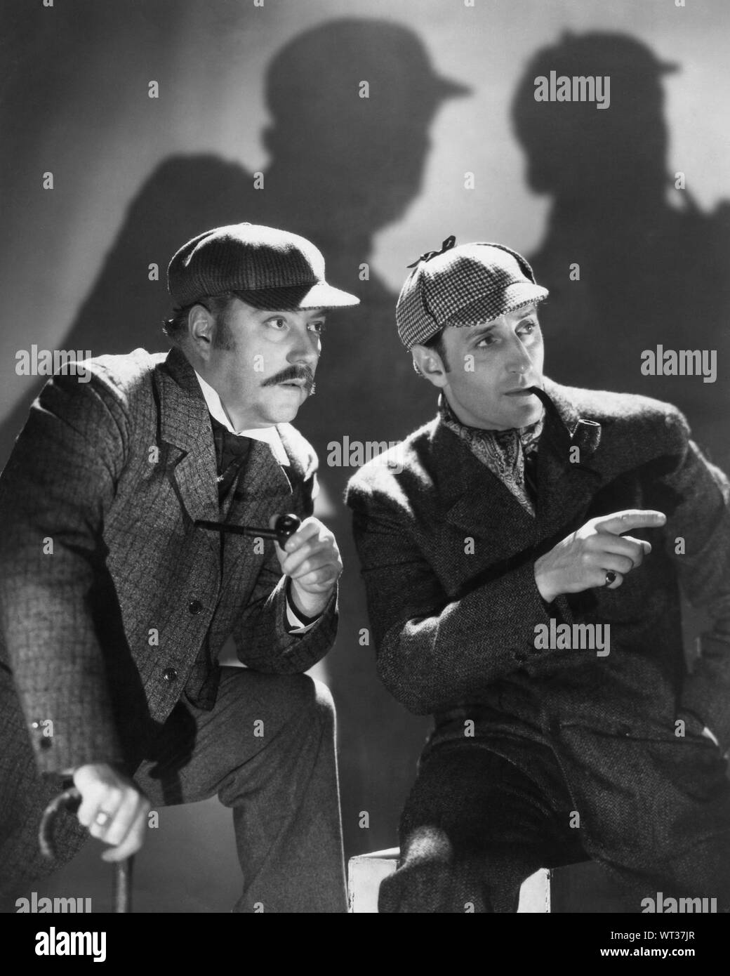 NIGEL BRUCE comme le Dr Watson et Basil Rathbone comme Sherlock Holmes dans Les aventures de Sherlock Holmes 1939 réalisateur Albert L. Werker personnages Arthur Conan Doyle jouer William Gillette Twentieth Century Fox Banque D'Images